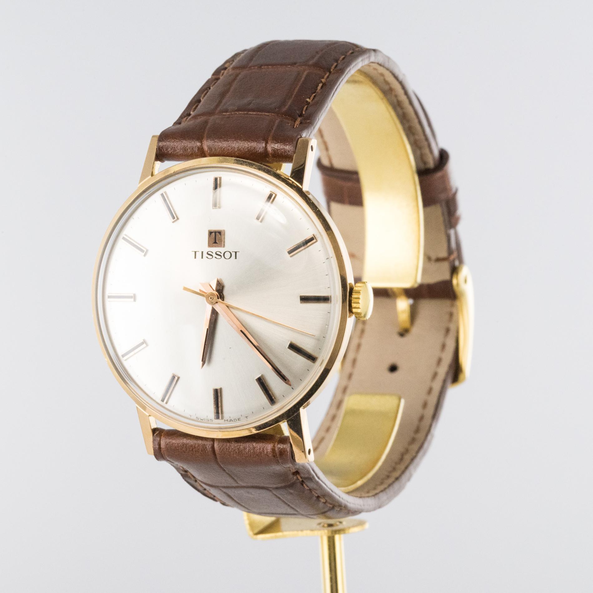 tissot 18 karat gold watch