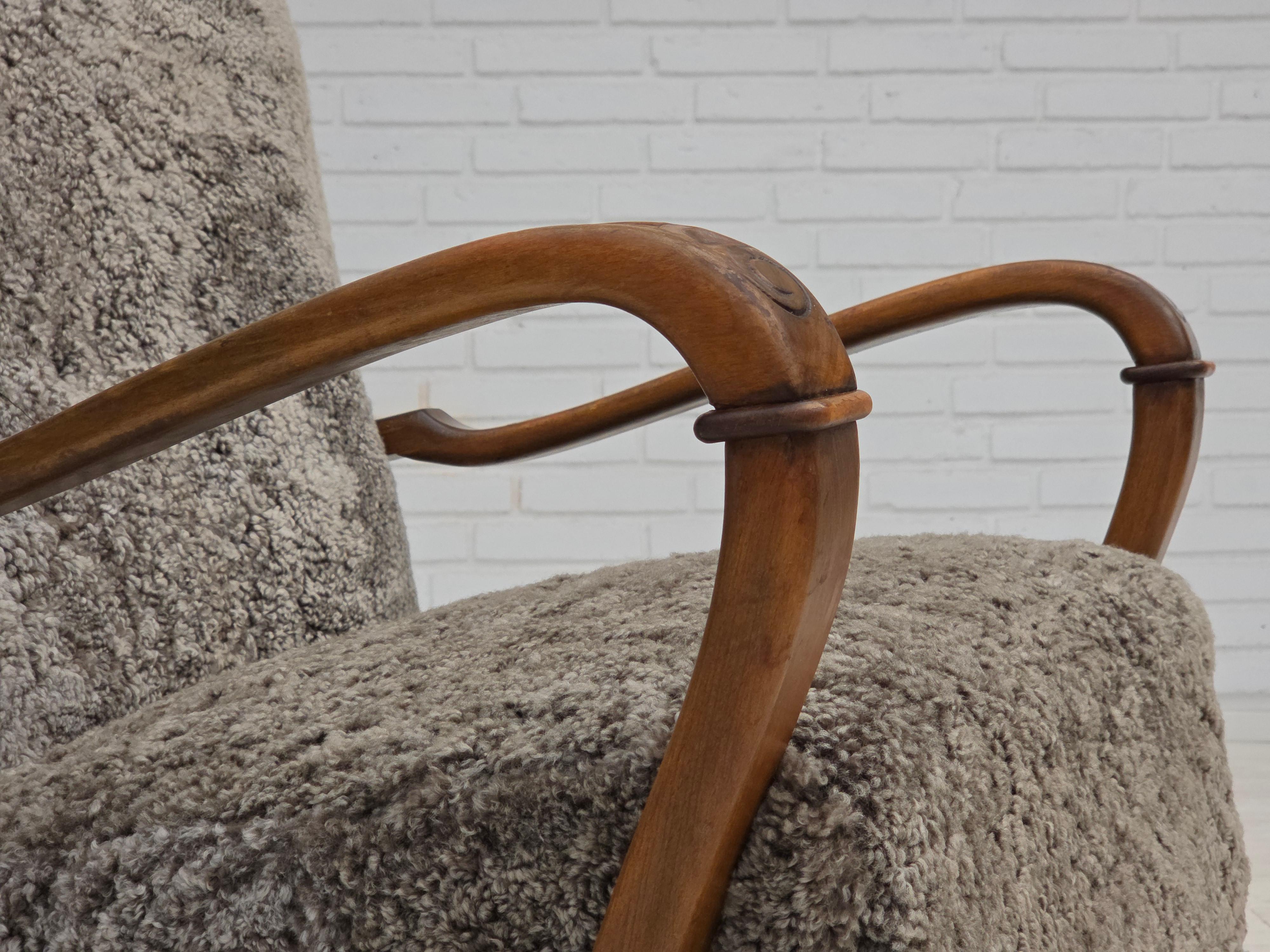 1960s, reupholstered Danish armchair, New Zealand genuine sheepskin. For Sale 6