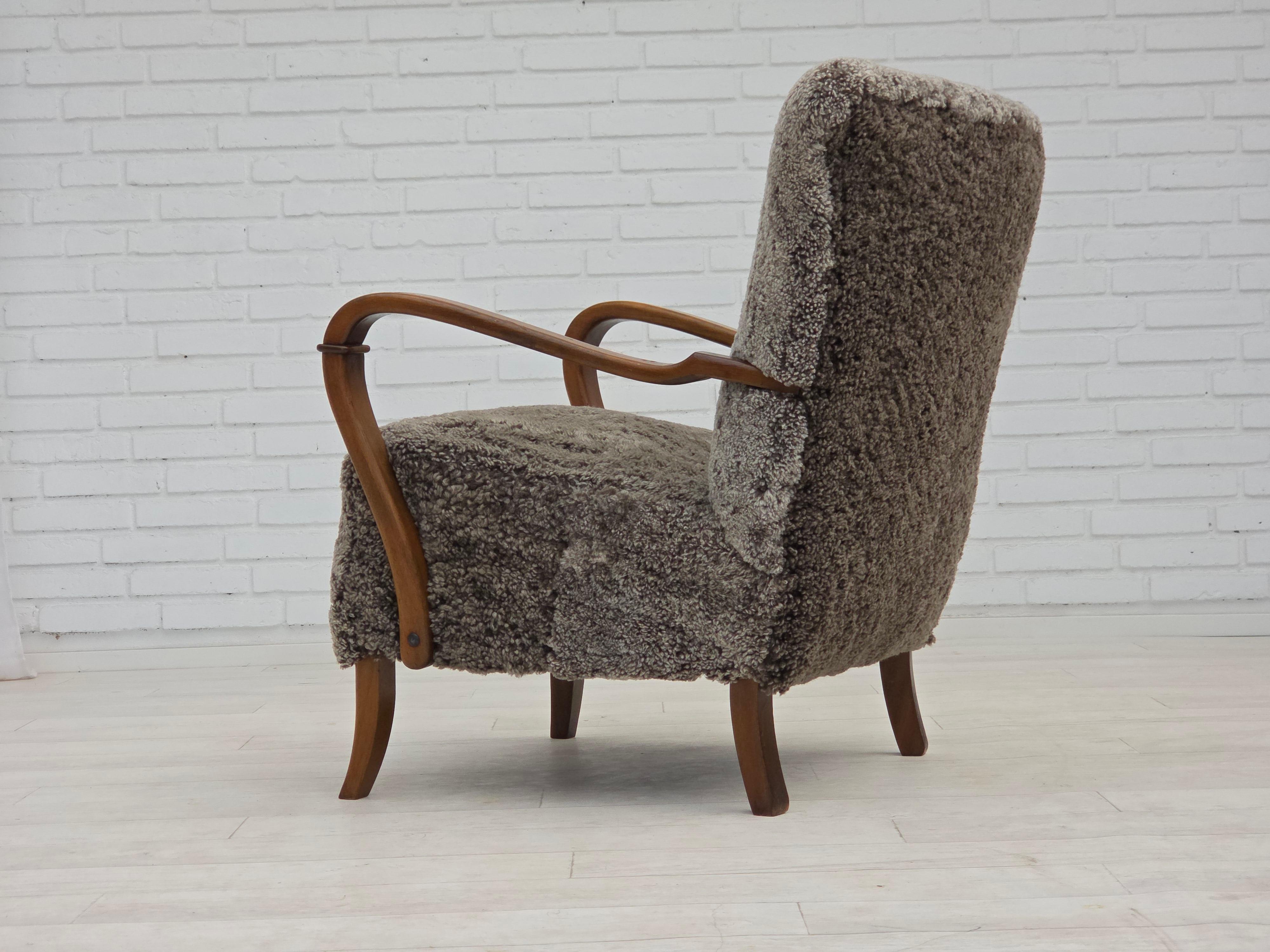 1960s, reupholstered Danish armchair, New Zealand genuine sheepskin. For Sale 2