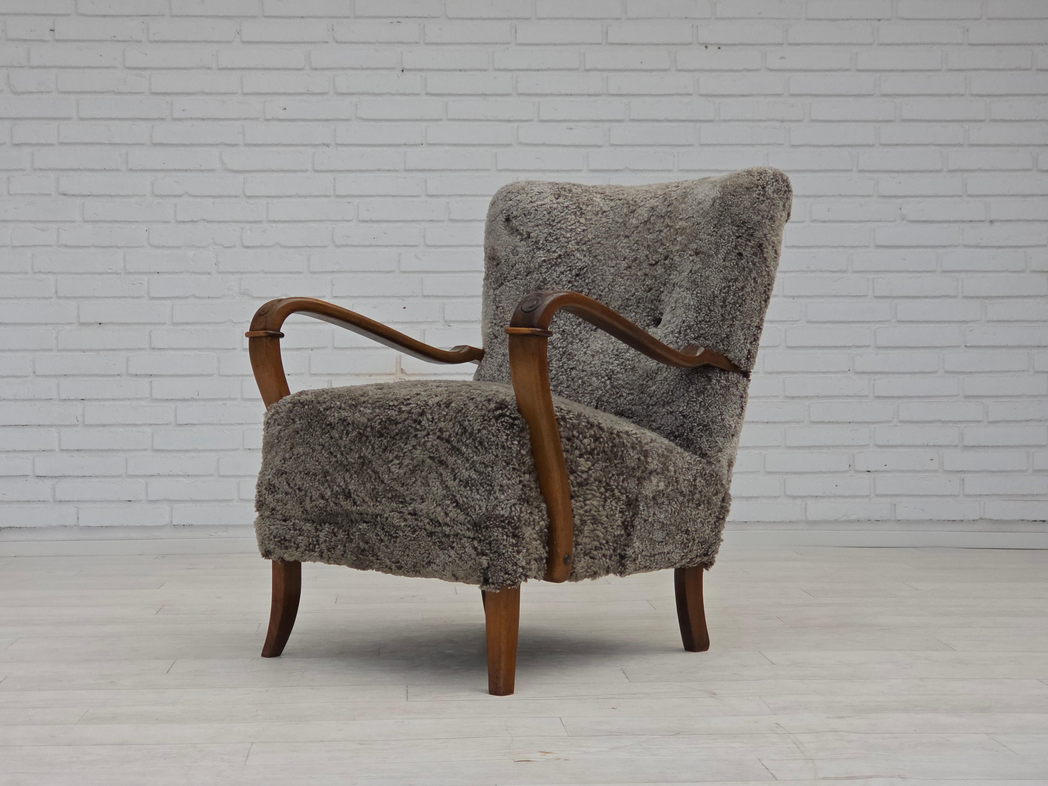 1960s, reupholstered Danish armchair, New Zealand genuine sheepskin. For Sale 3