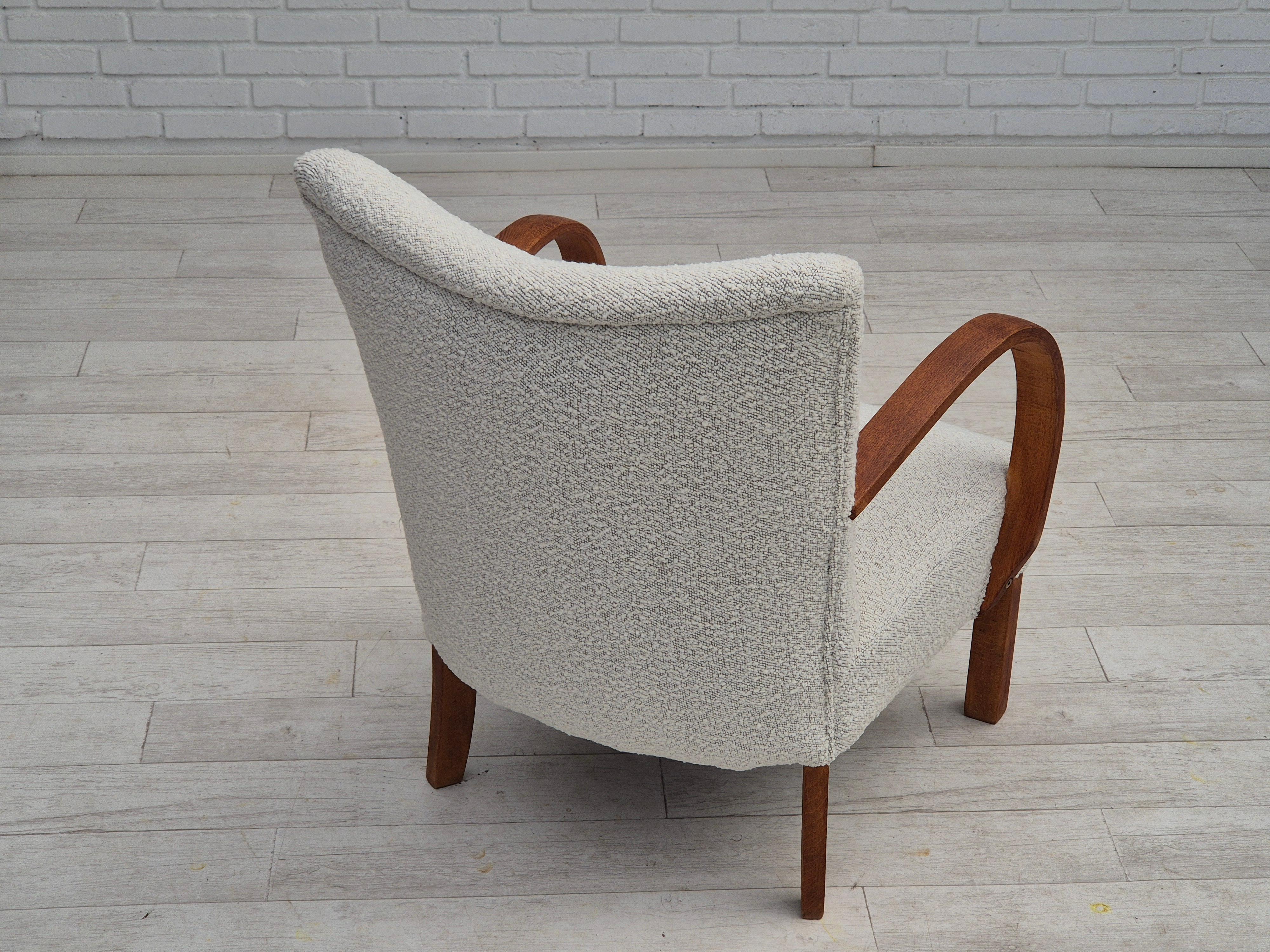 Mid-20th Century 1960s, reupholstered Danish art-deco armchair, beech wood, leather. For Sale
