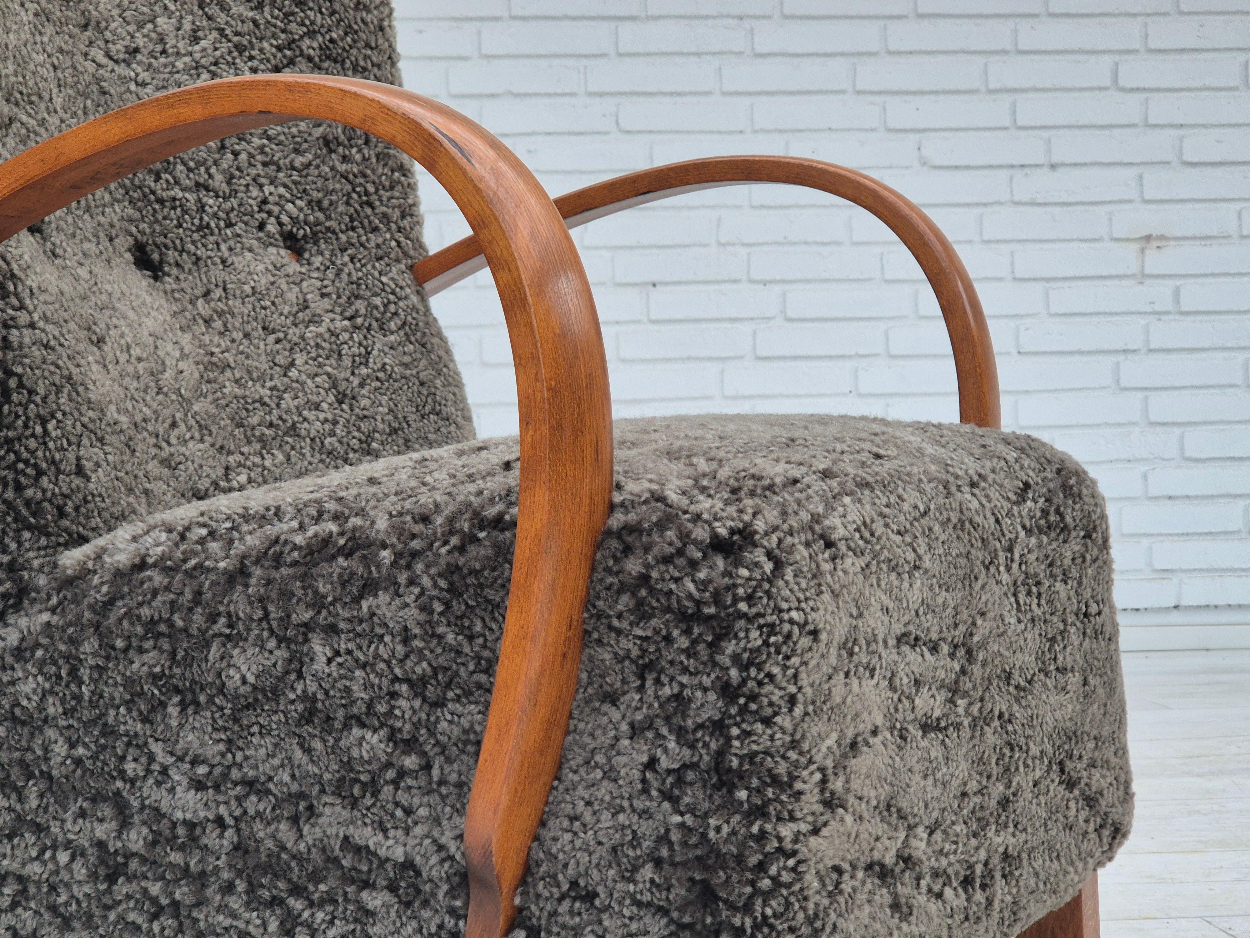 1960s, reupholstered Danish art deco armchair, genuine New Zealand sheepskin. For Sale 4