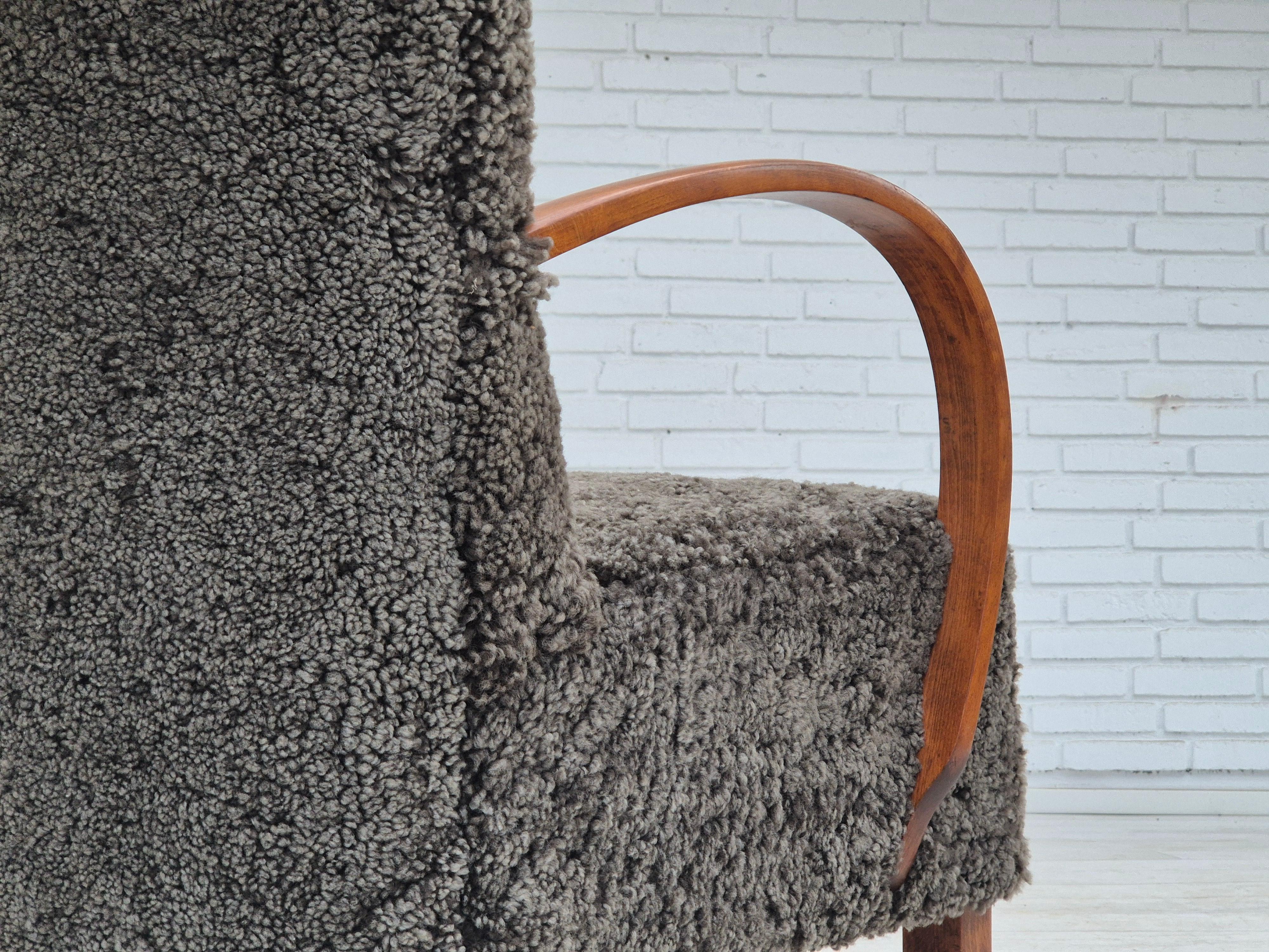1960s, reupholstered Danish art deco armchair, genuine New Zealand sheepskin. For Sale 12