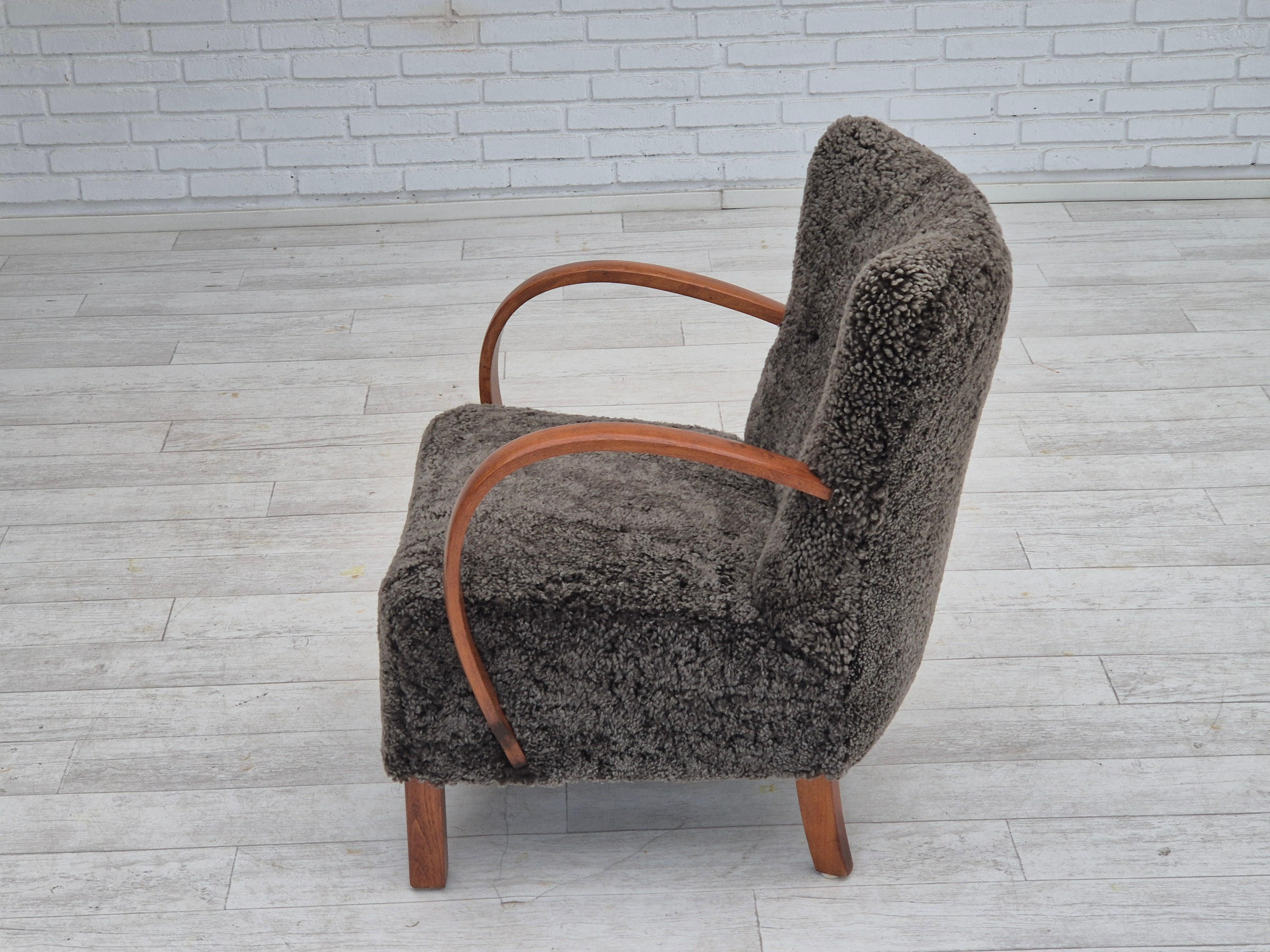 1960s, reupholstered Danish art deco armchair, genuine New Zealand sheepskin. For Sale 13