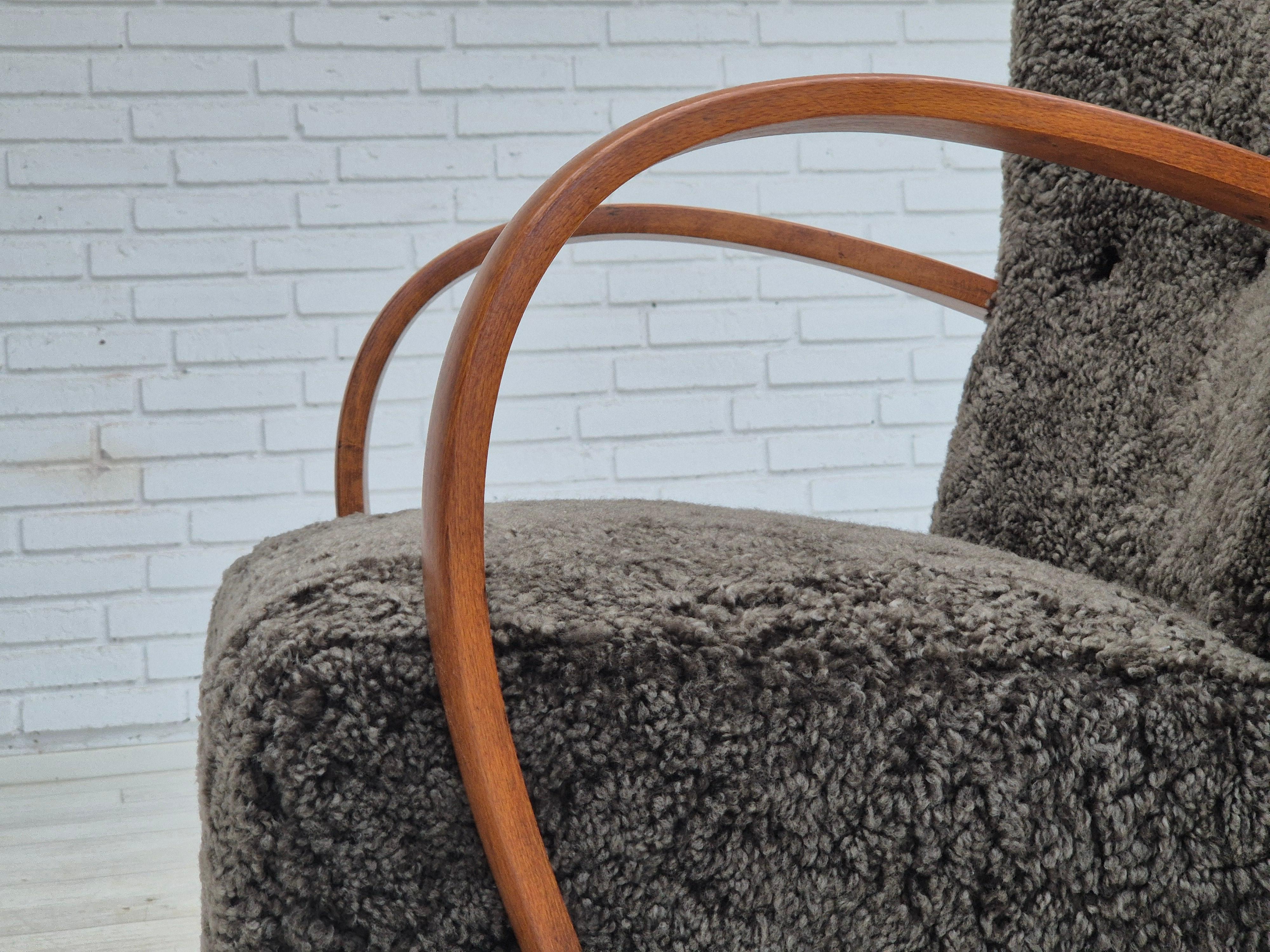1960s, reupholstered Danish art deco armchair, genuine New Zealand sheepskin. For Sale 14