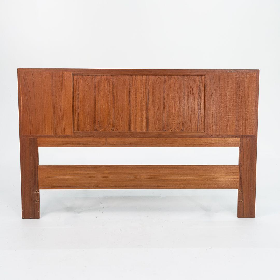 This is a reversible Teak and Cane Full Headboard, designed by Arne Wahl Iversen and manufactured by Danish firm Falster Mobelfabrik in the 1960s. The piece is formed of solid and veneered teak, and features a caned insert that can be reversed to