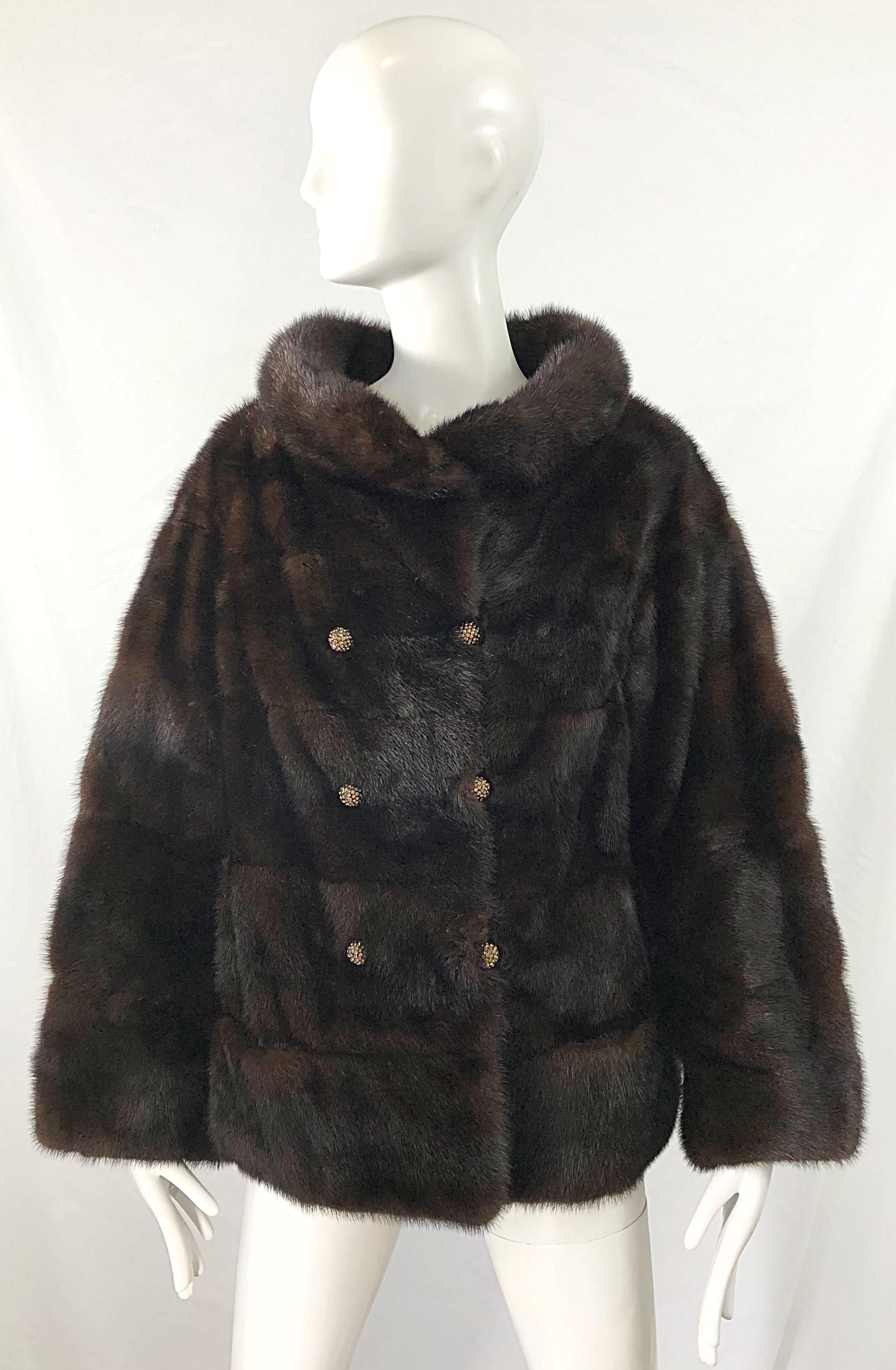 Beautiful 1960s REVILLON mink mahogany brown female pelt jacket ! Features the most luxurious mink fur that one would expect from the esteemed fur house. Double breasted style with pretty rhinestone encrusted buttons and fur hook-and-eye closure at
