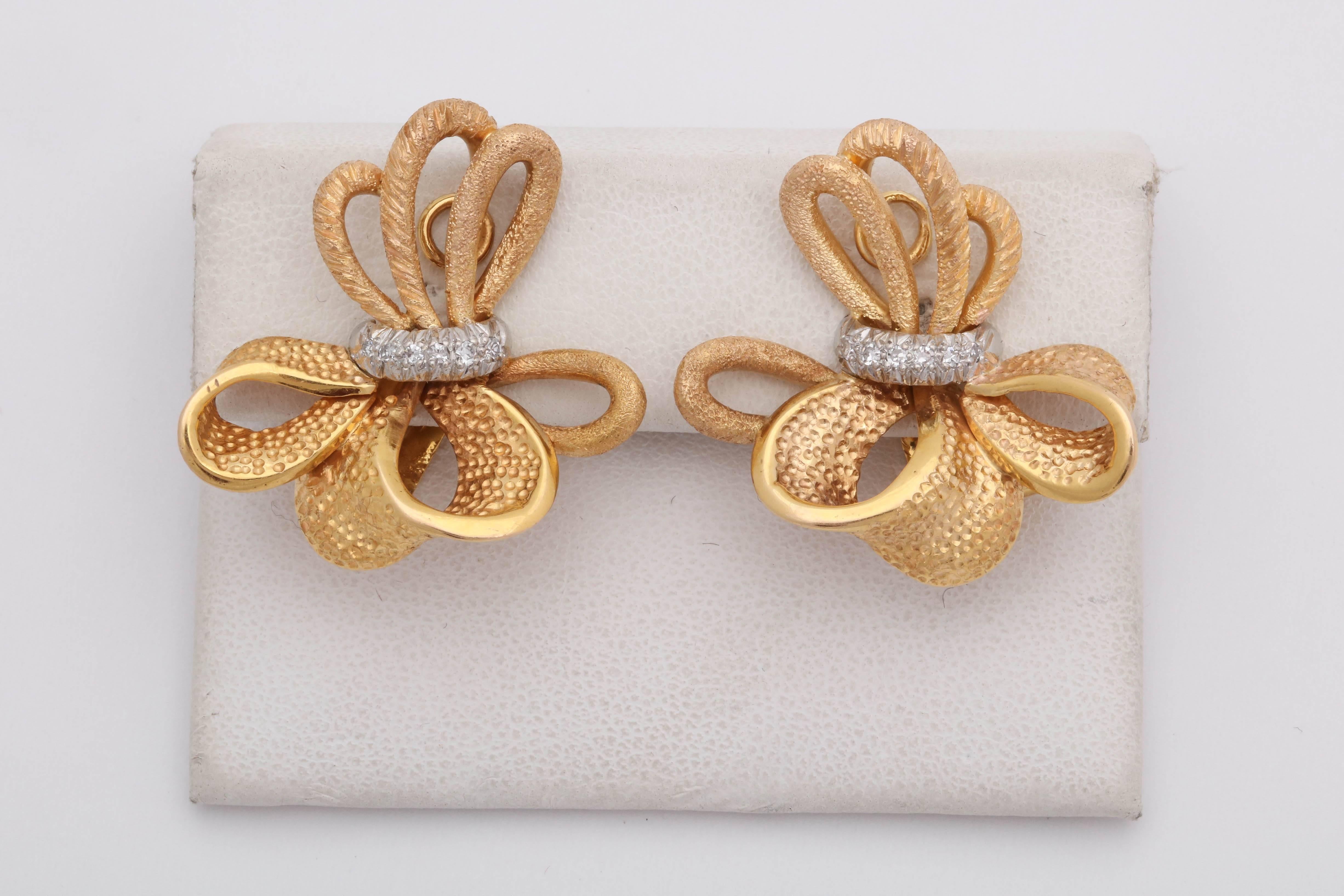 One Pair Of Ladies Bow Knot Design Bow Earrings Designed In 18kt Gold. In Center Of Earrings Are 16 Diamonds Weighing Approximately .90 Cts Total Weight. NOTE:Fancy Clip On Earrings May Add Posts For Pierced Ears. Designed In The 1960's In The