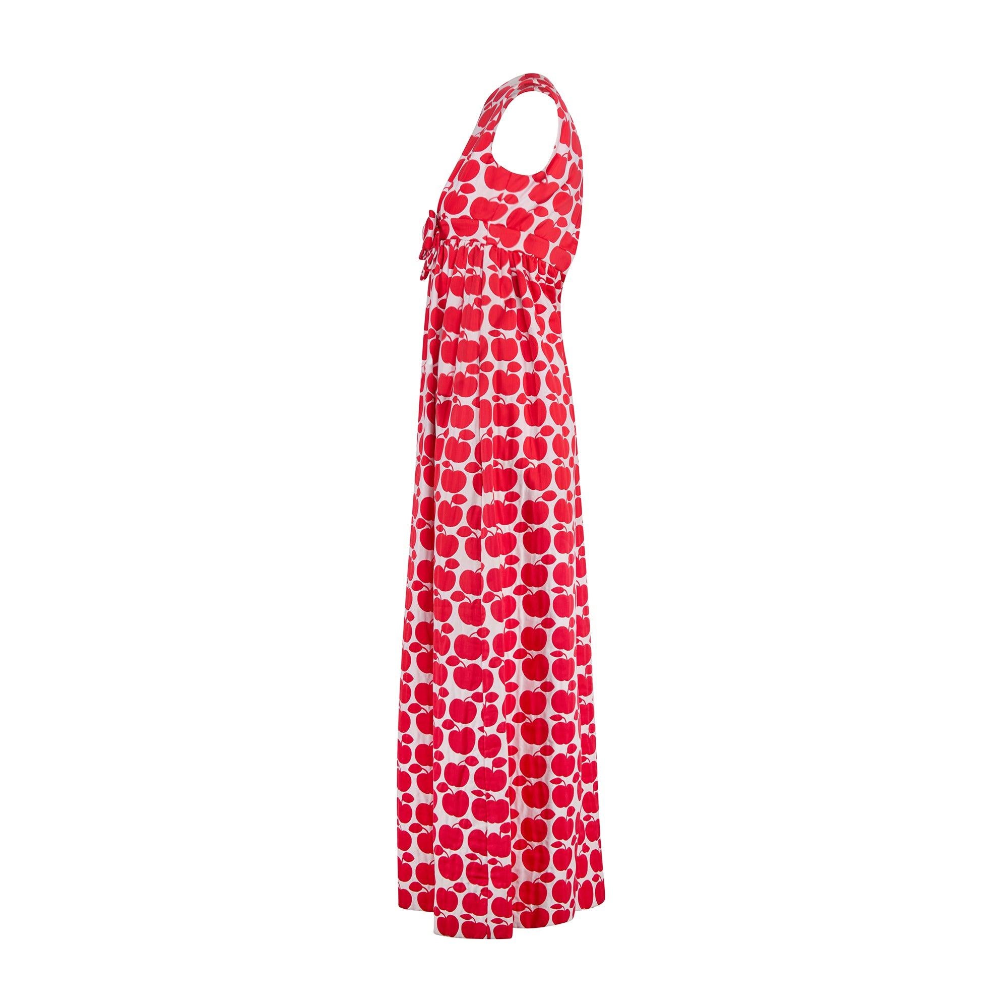 This playful and vibrant maxi-dress was made for Richard Blauner’s Boutique in the late 1960s and it is so well made. Tailored to a classic empire silhouette that falls to the ankle, the fabric is stunning, a thick cream cotton intarsia-woven with