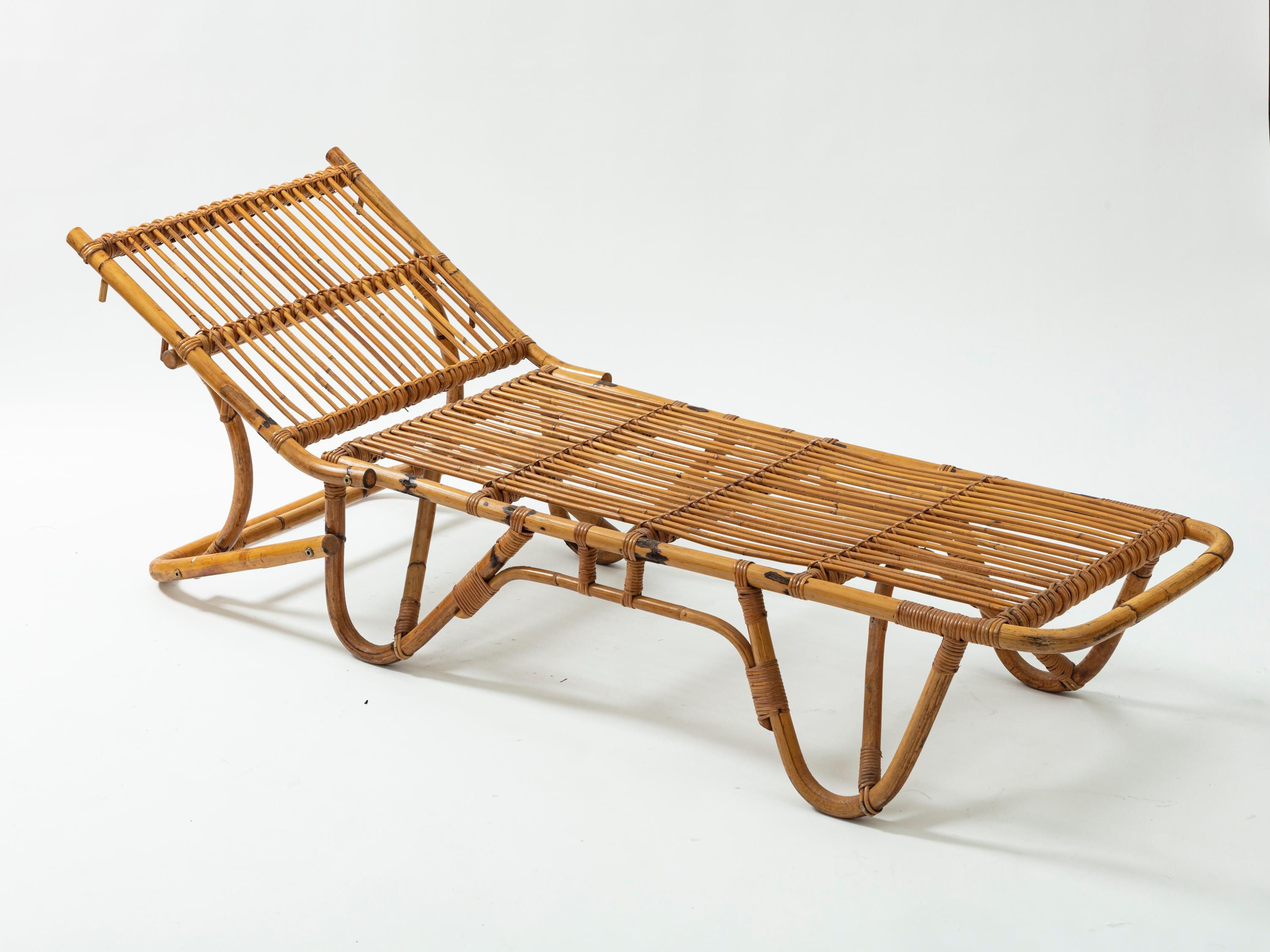 1960s Riviera style French rattan chaise longue.