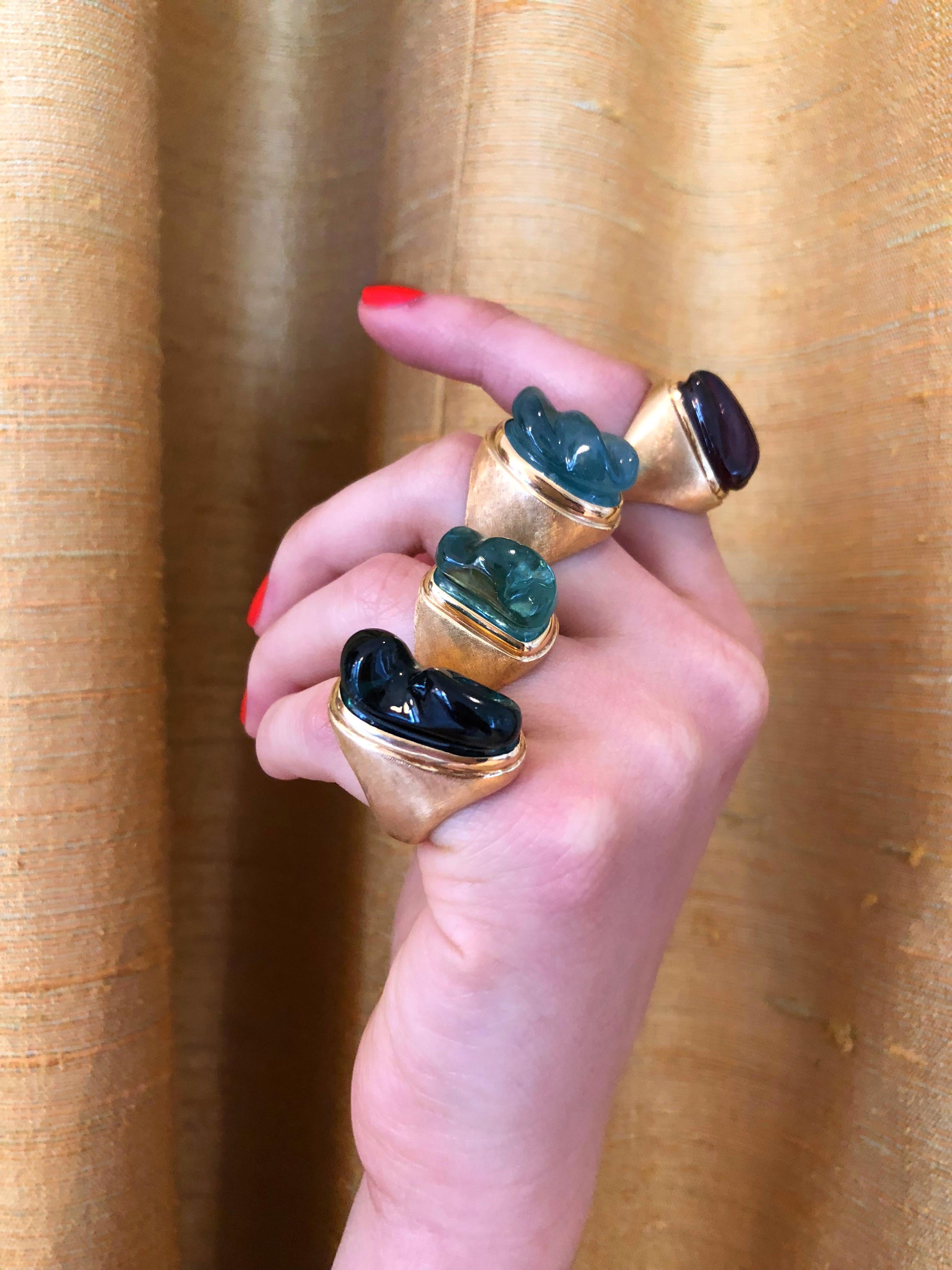 A forma livre carved tourmaline and 18 karat gold ring, by Roberto Burle Marx, c. 1960. 

This ring measures a size 4. It is stamped Burle Marx, IND BRA, GB 519, 750. It measures 1
