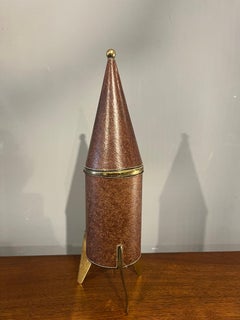 1960's "rocket" cigarette dispenser in brass and leather by Patented