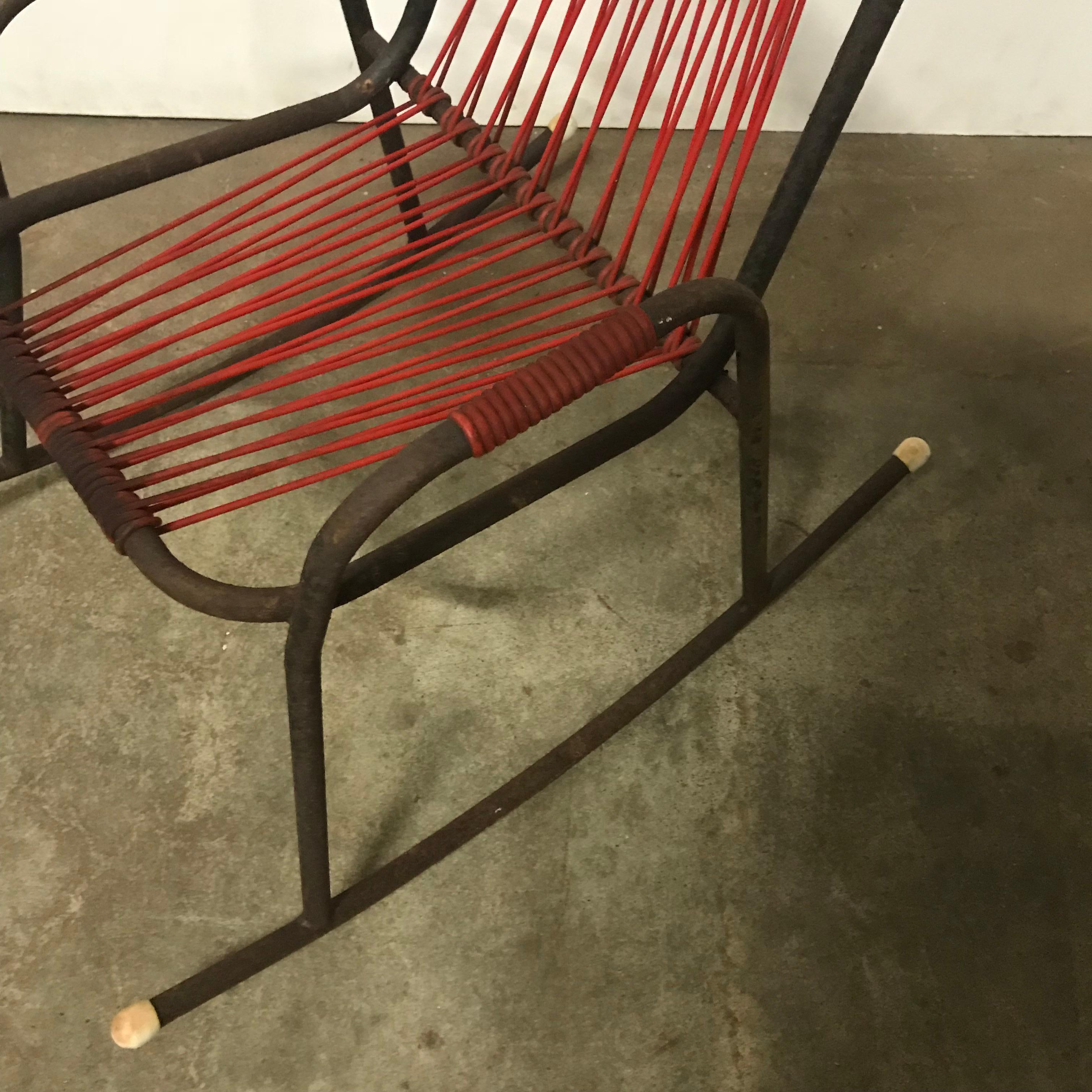 Mid-20th Century 1960s Rocking Chair in Red Plastic Strings on Black Metal Frame For Sale