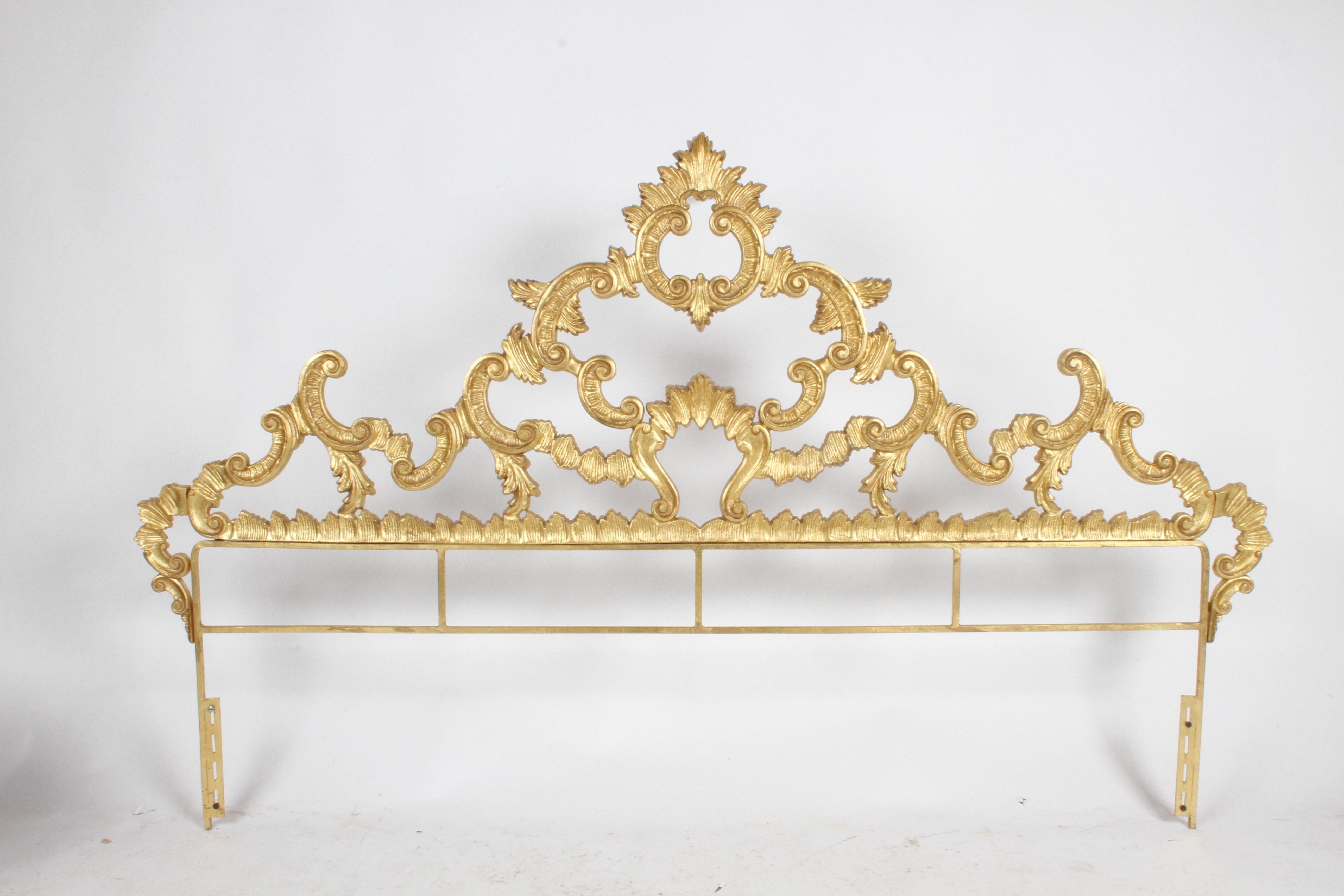 Very Hollywood Regency, Italian Rococo style king headboard with gold gilt. Cast metal, appears to have original gold paint, made in Italy. In very nice condition, very little wear, no breaks. Glamorous!! Mounting hardware is 76