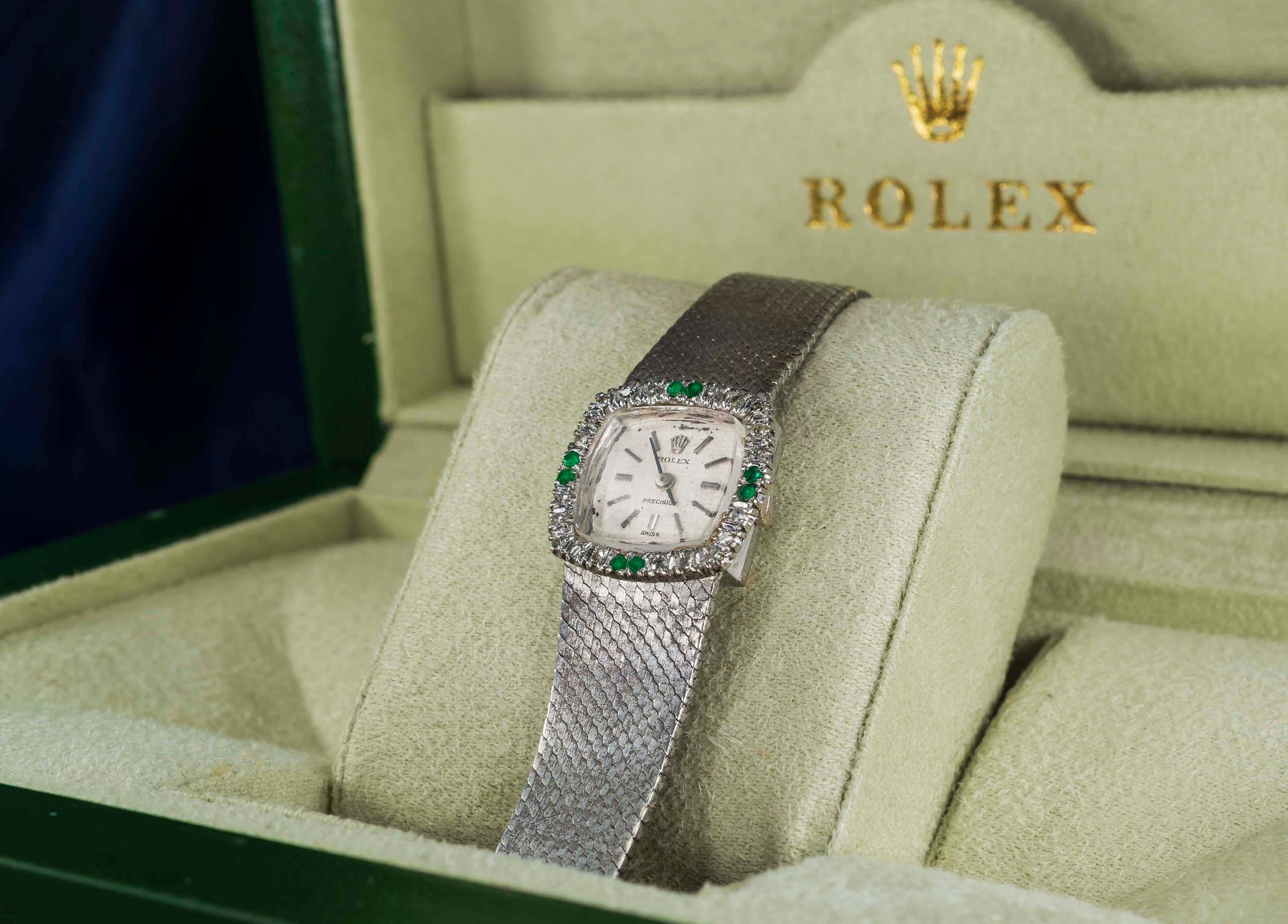 An Iconic 1960s Rolex 18kt White Gold Emerald & Diamond Set Bracelet Watch

Basic Dimensions & Specifications 
⁃     Case Dimensions 21mm Width x 21mm Height
-	Wrist Size Fits up 170mm wrist 
 * Can be resized to be extended or tapered as a