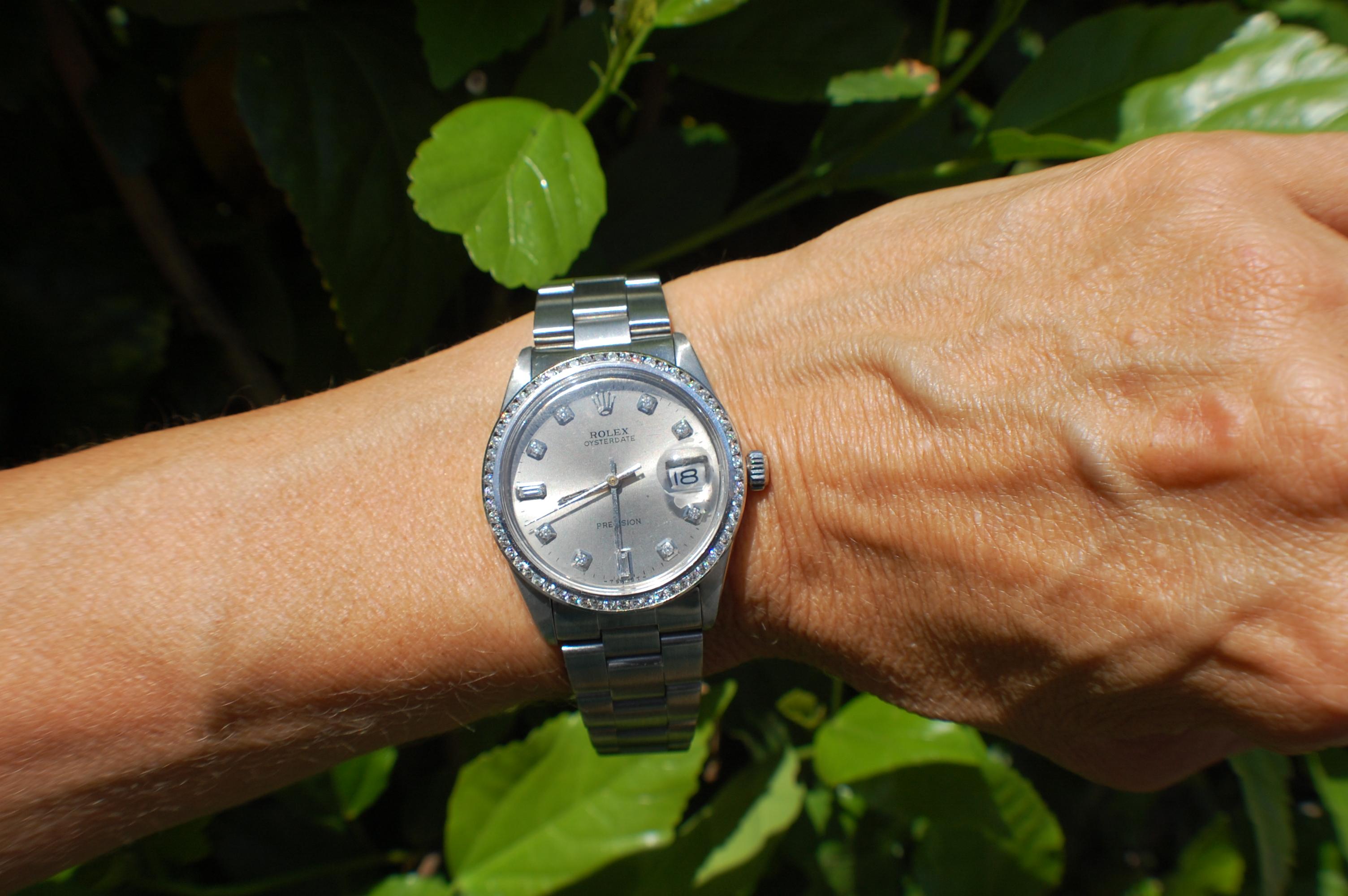 1974's Rolex Oysterdate Precision Watch Diamond Bezel and Dial Silver Mint condition.
This watch is a gem! The condition of the watch is very good as this is a vintage watch model number 6694
Serial number is 3347533
Strap is marke 78350 and is an