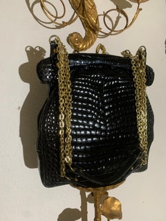 Borsellino in coccodrillo nero Rosenfeld anni '60 con chiusura superiore ad arco e catena