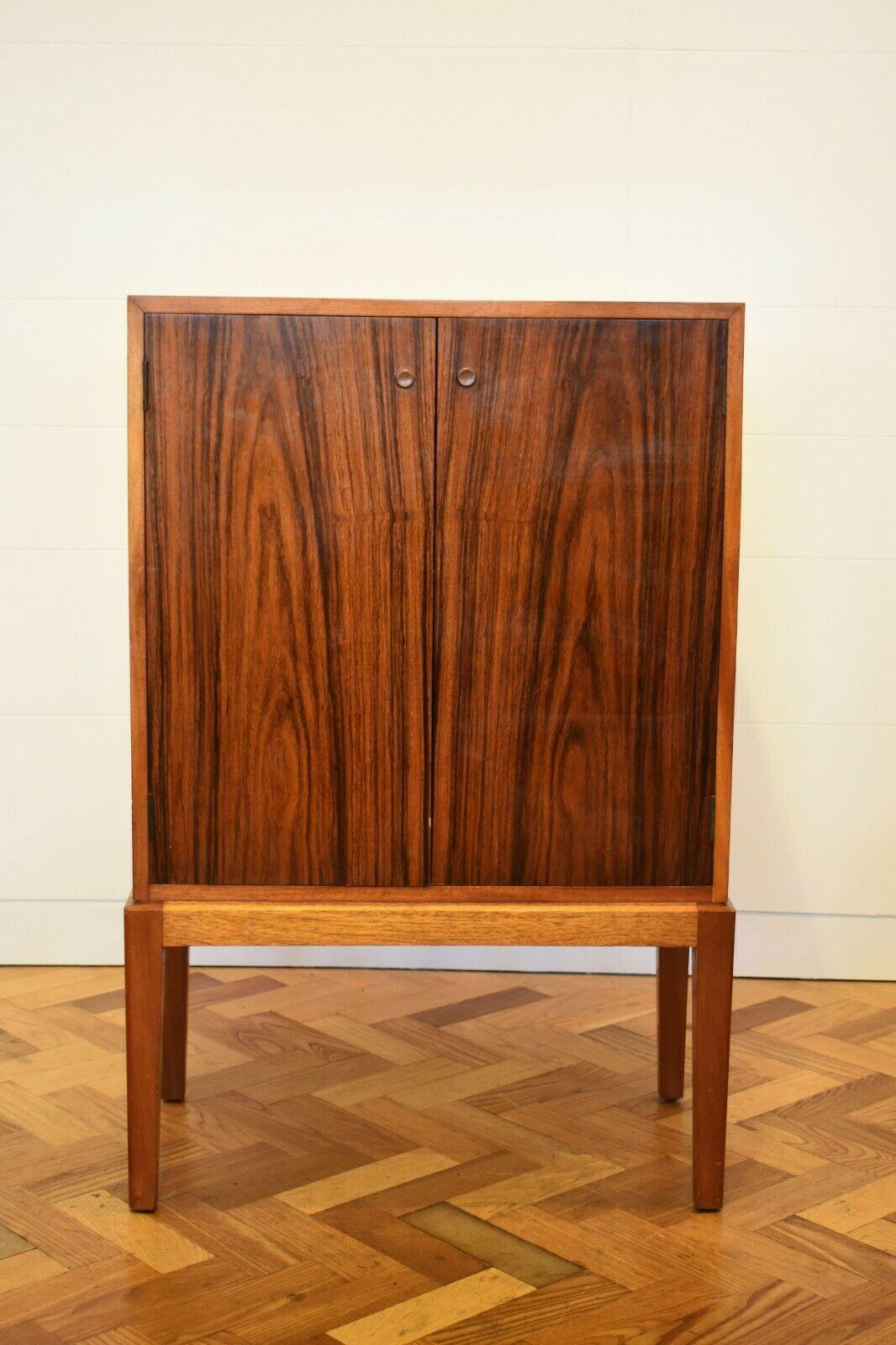 1960s rosewood and walnut record cabinet

This sleek record cabinet features great storage opportunity for vinyls. 

Boasting a beautiful grain within the rose.