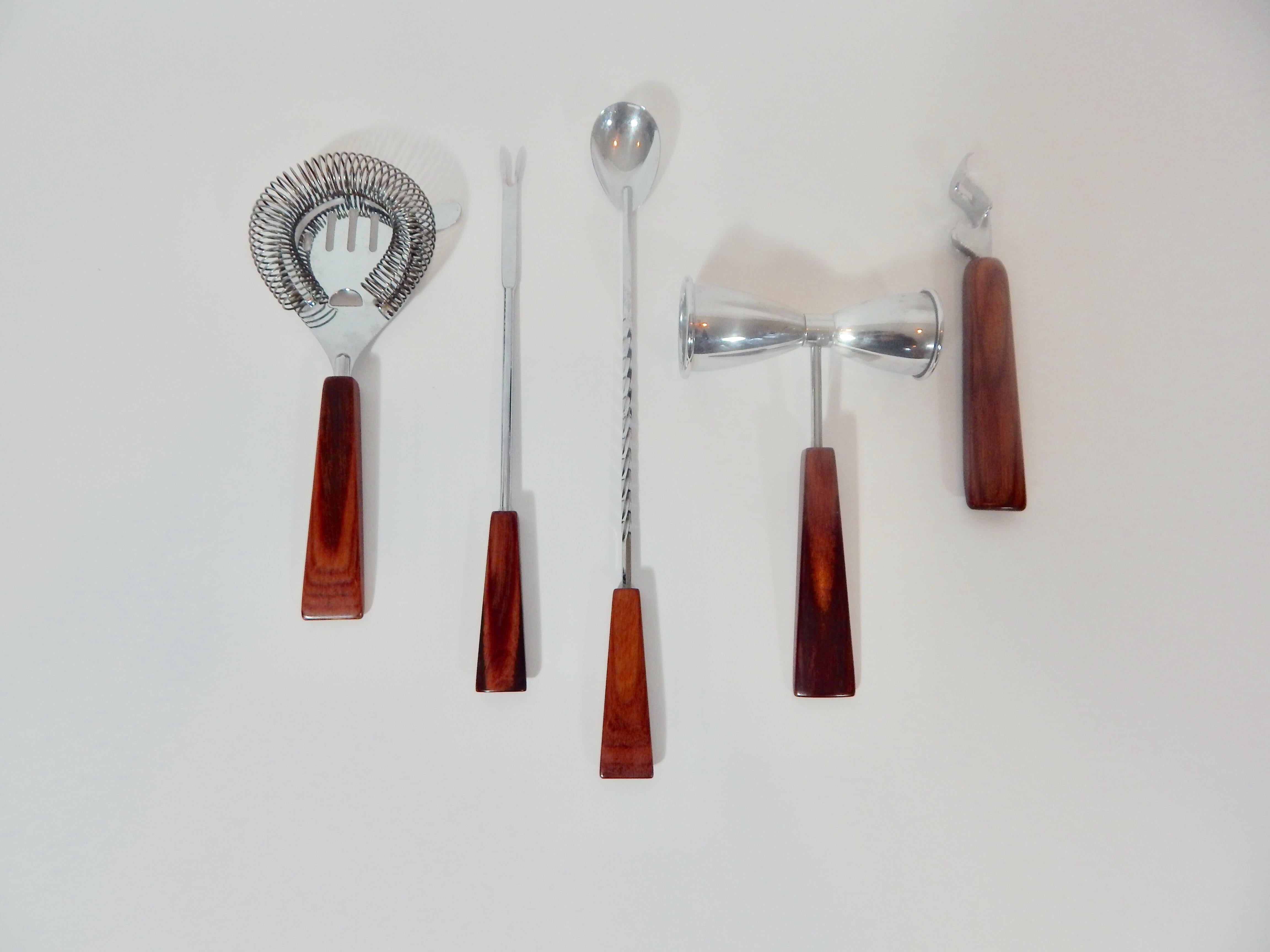 Midcentury 1960s barware utensil set with rosewood handles. 6 pieces set. Excellent condition.
We offer free complimentary domestic priority shipping for this item.