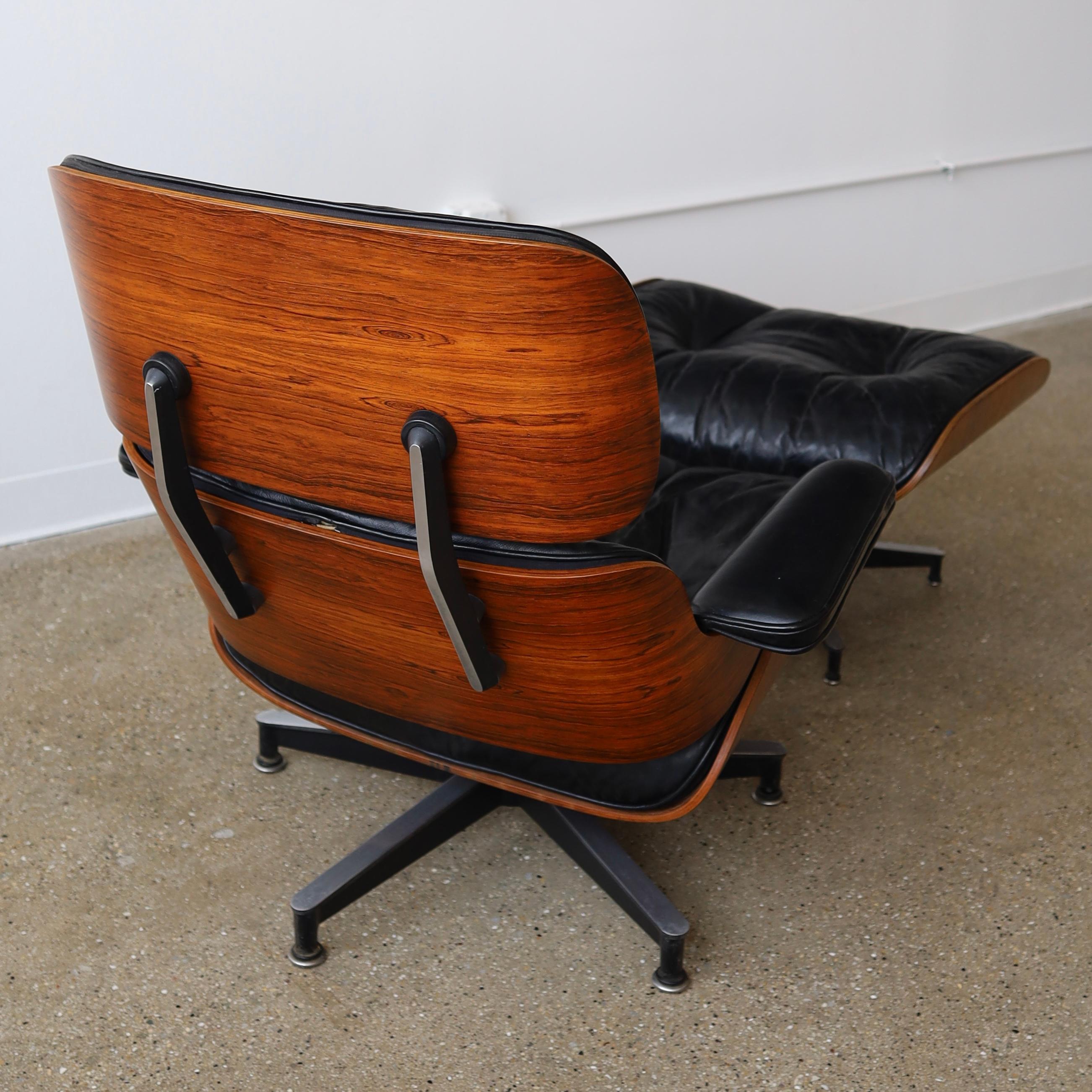 1960s Rosewood Eames Chair + Ottoman In Good Condition For Sale In Chicago, IL