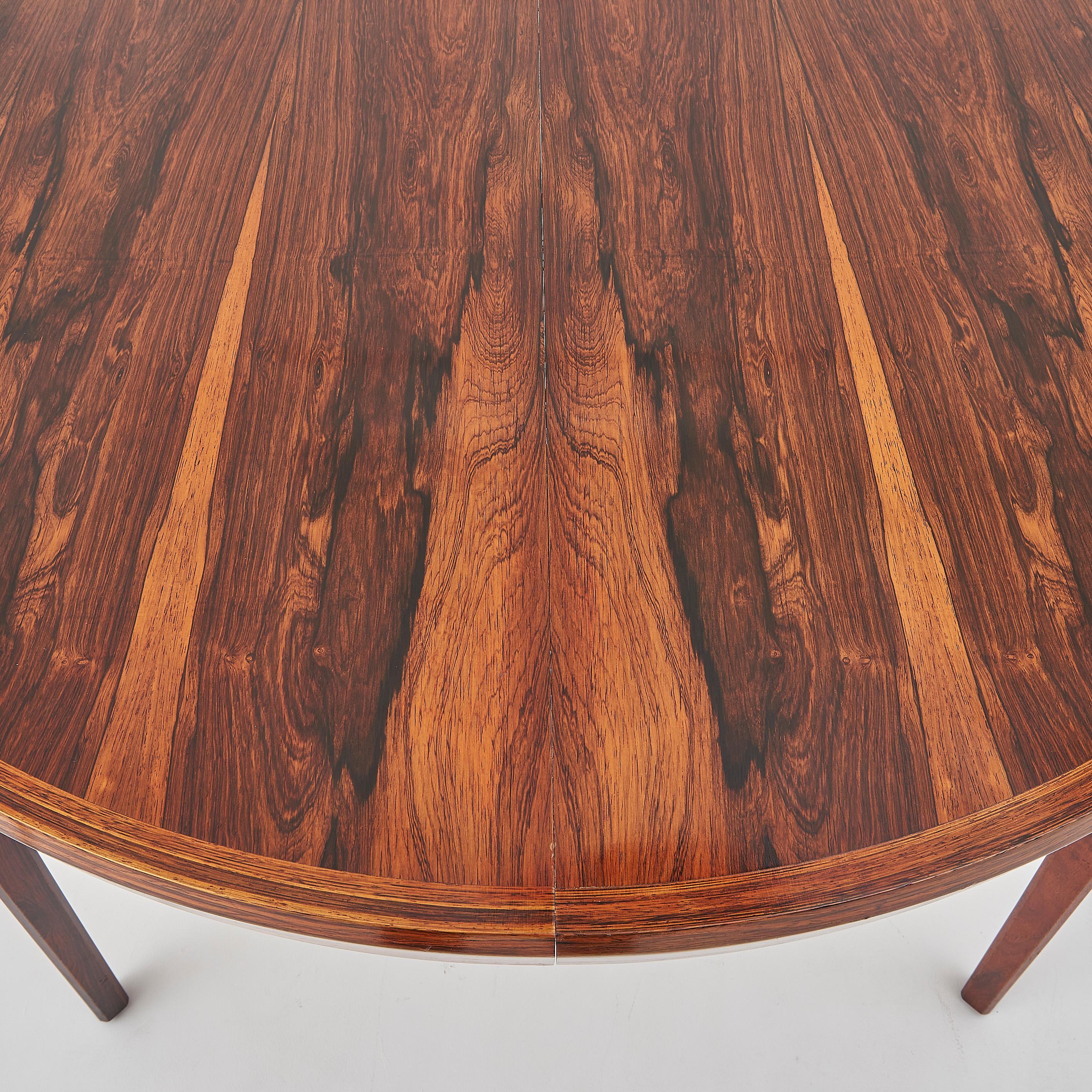 Mesa de comedor extensible danesa de mediados del siglo XX de palisandro de los años 60 en venta 4