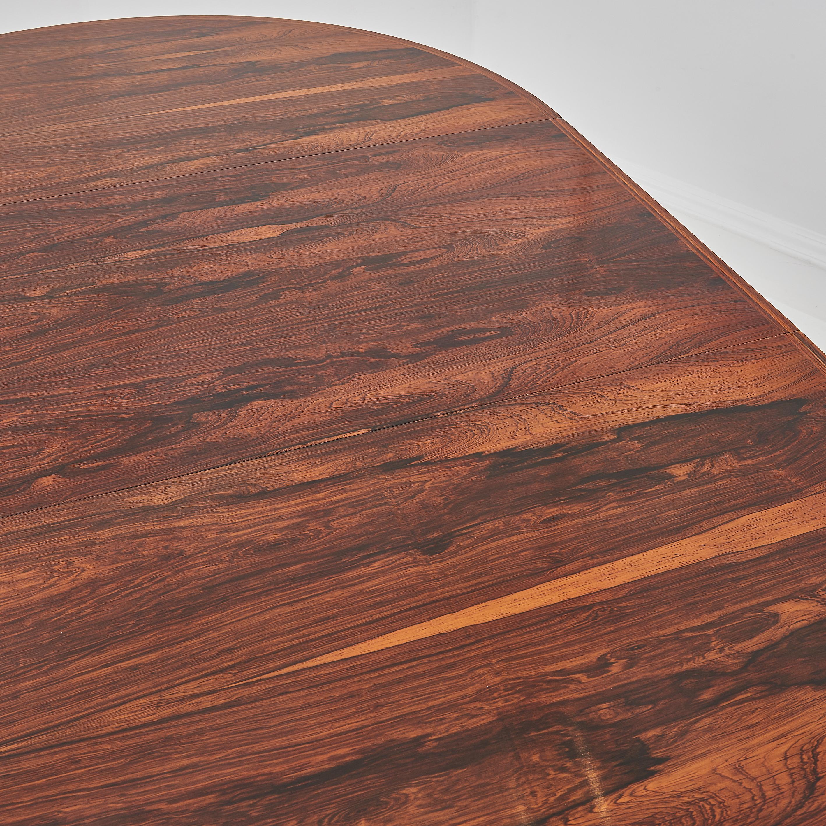 Mesa de comedor extensible danesa de mediados del siglo XX de palisandro de los años 60 en Bueno estado para la venta en London, GB