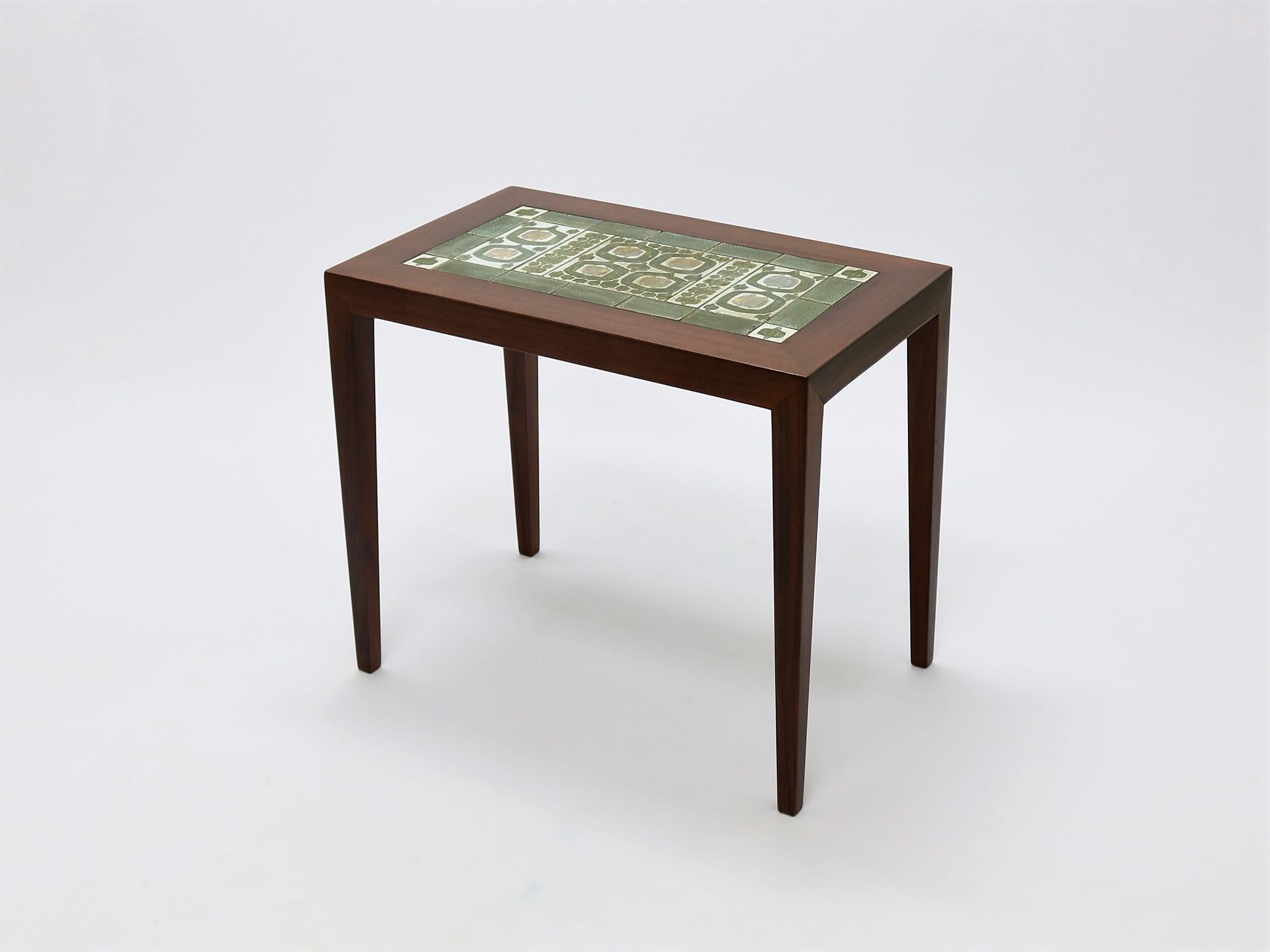 Side table in rosewood with ceramic tiles from Royal Copenhagen. The table was designed by Severin Hansen Jr. for Haslev Mobelfabrik in Denmark in the 1960s. The table has ceramic tiles in the top from the 