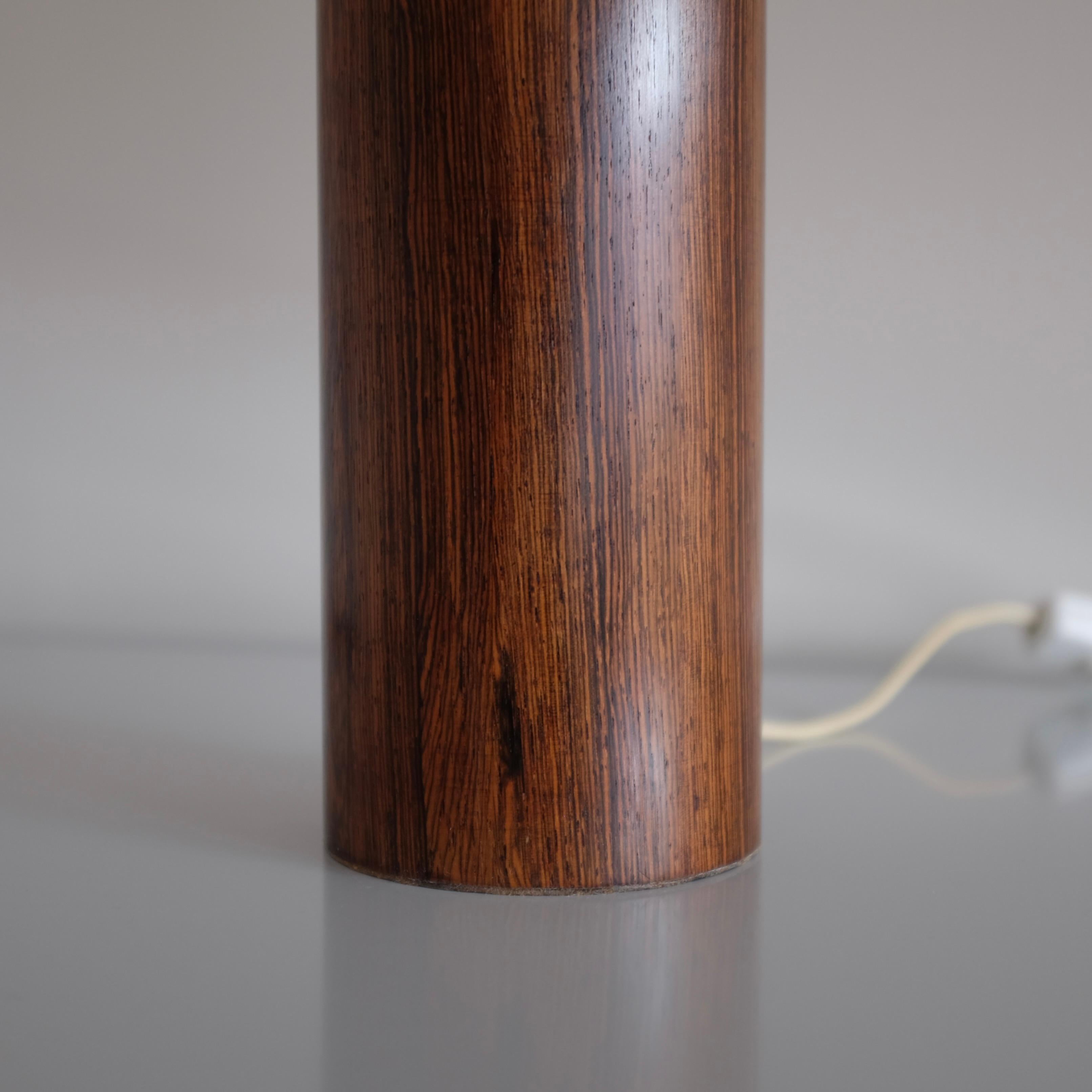 Swedish 1960s Rosewood table lamp by Luxus For Sale