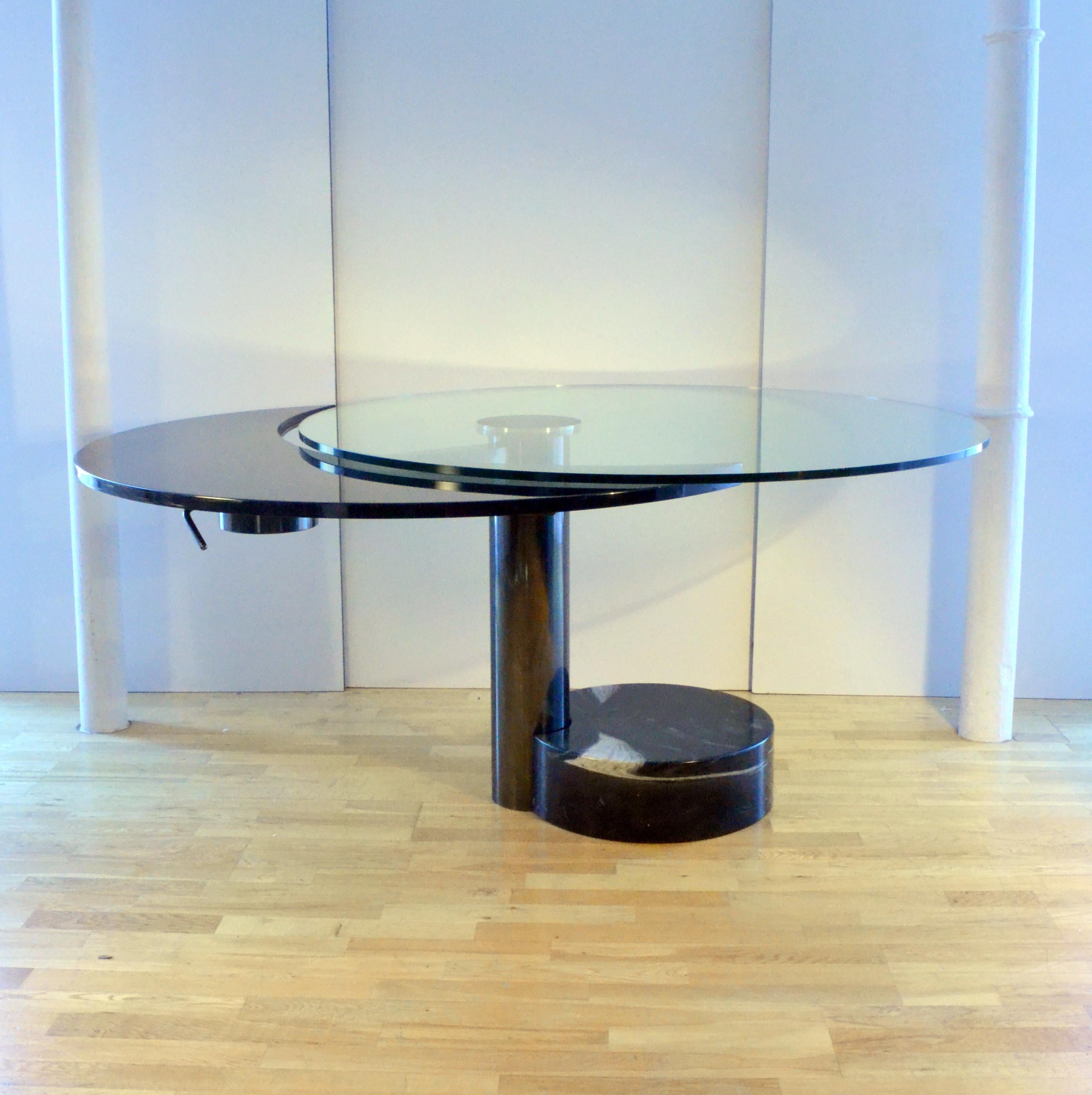 Stainless Steel 1960s Round Dining Table with Black Oval Extension Attributed to Pierre Cardin