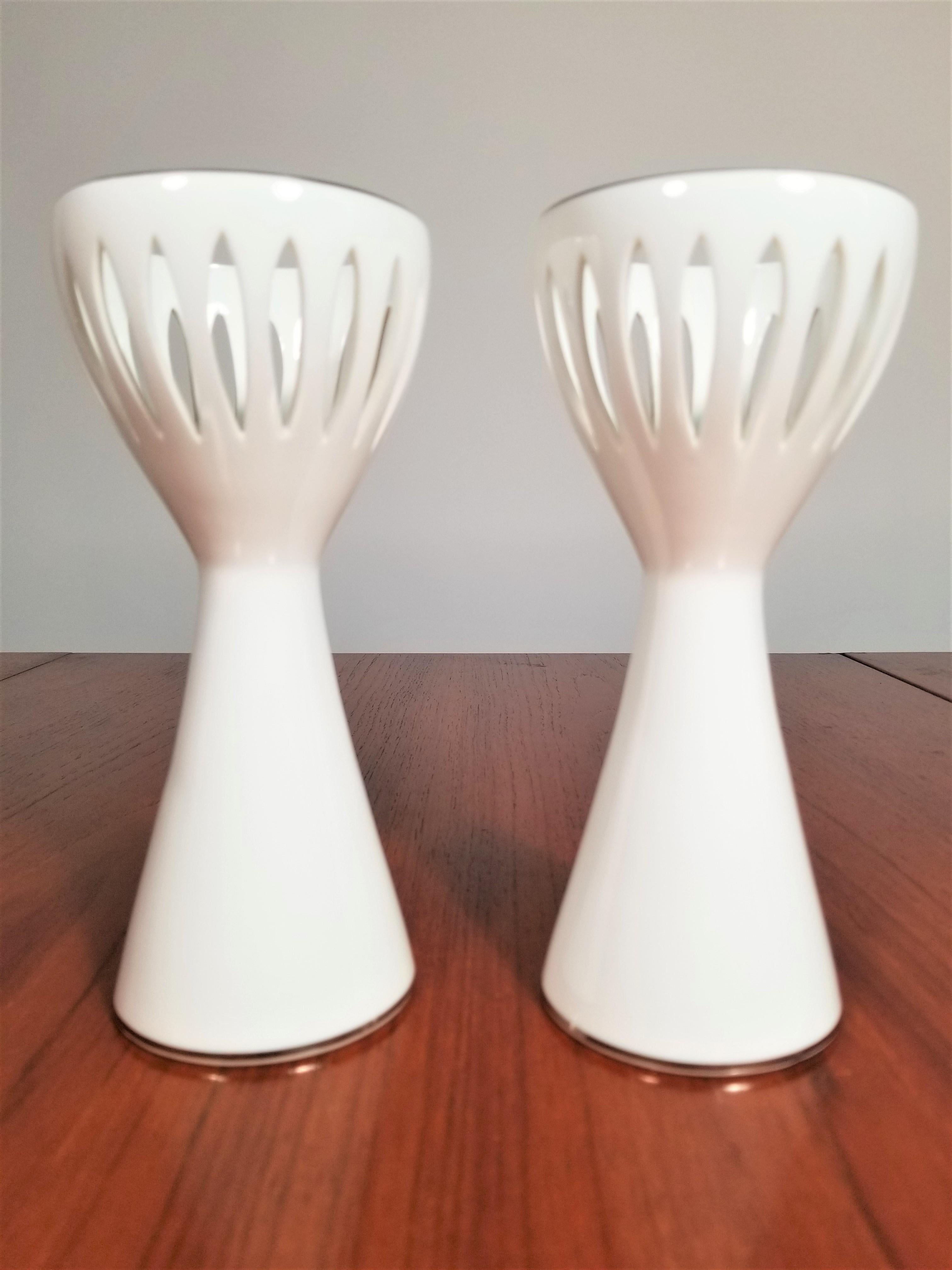Pair of Mid-Century Candlesticks or Candleholders.  Fine White Bone China with Silver Trim.. Mid-Century 1960s Mod sculptural design. Makers marking on bottom. Excellent condition.