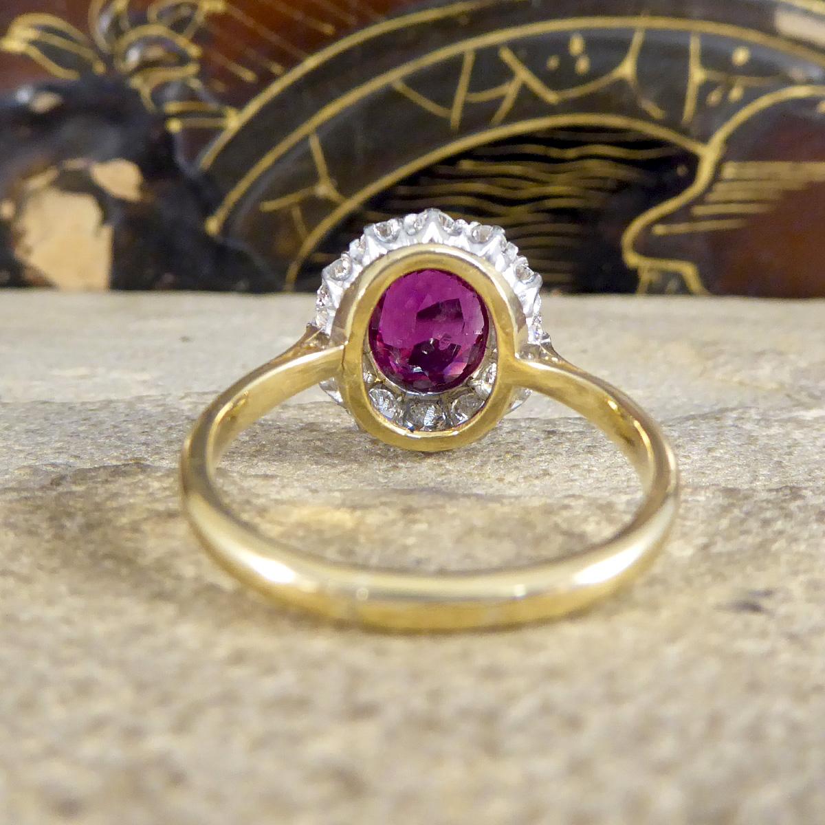 Round Cut 1960s Ruby and Diamond Cluster Ring in 18 Carat Yellow and Platinum For Sale