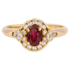 1960s Ruby Diamonds 18 Karat Yellow Gold Oval Ring