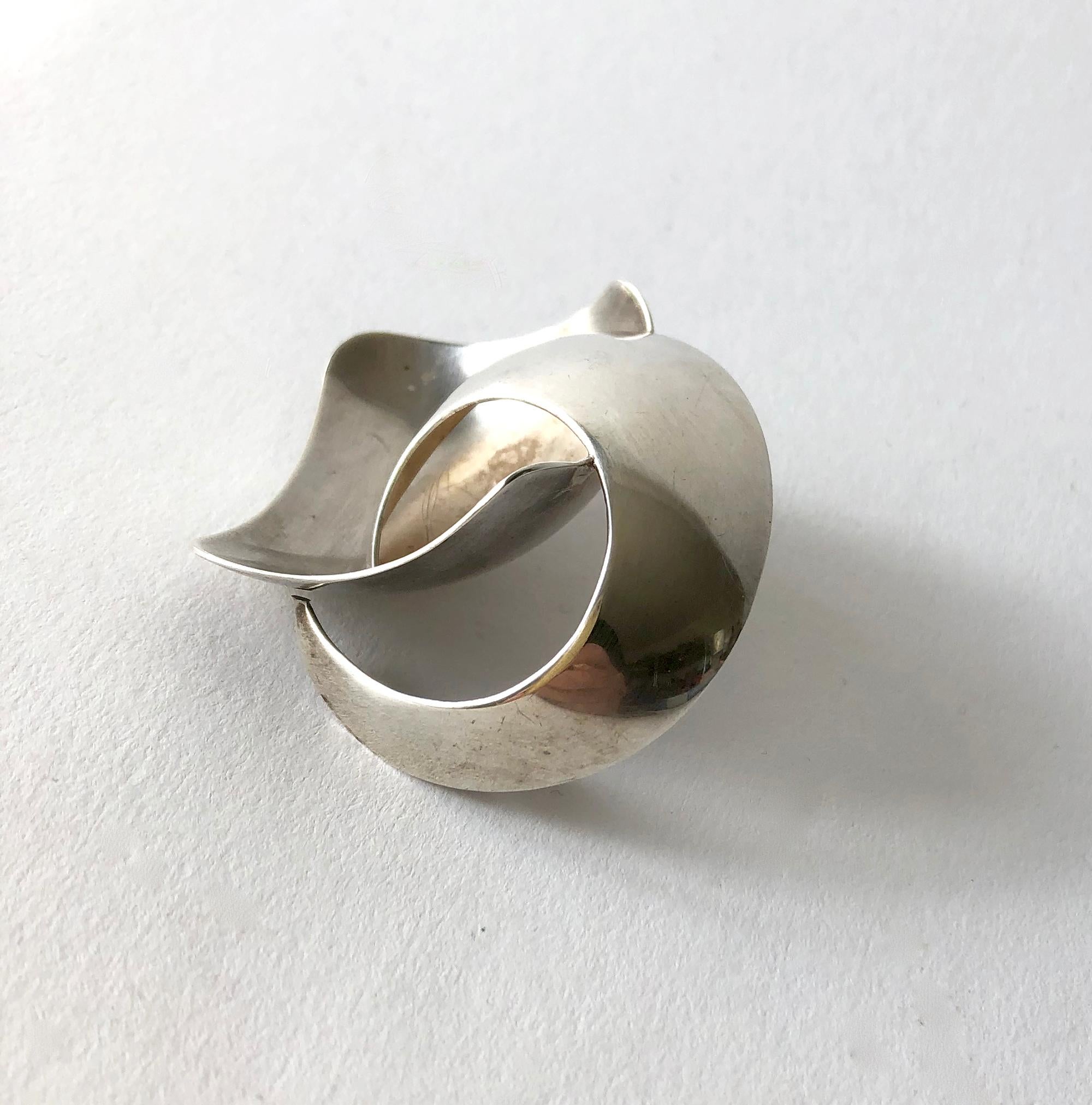 1960's sterling silver anticlastic brooch created by Ruth Berridge of New York, New York. Brooch measures 2