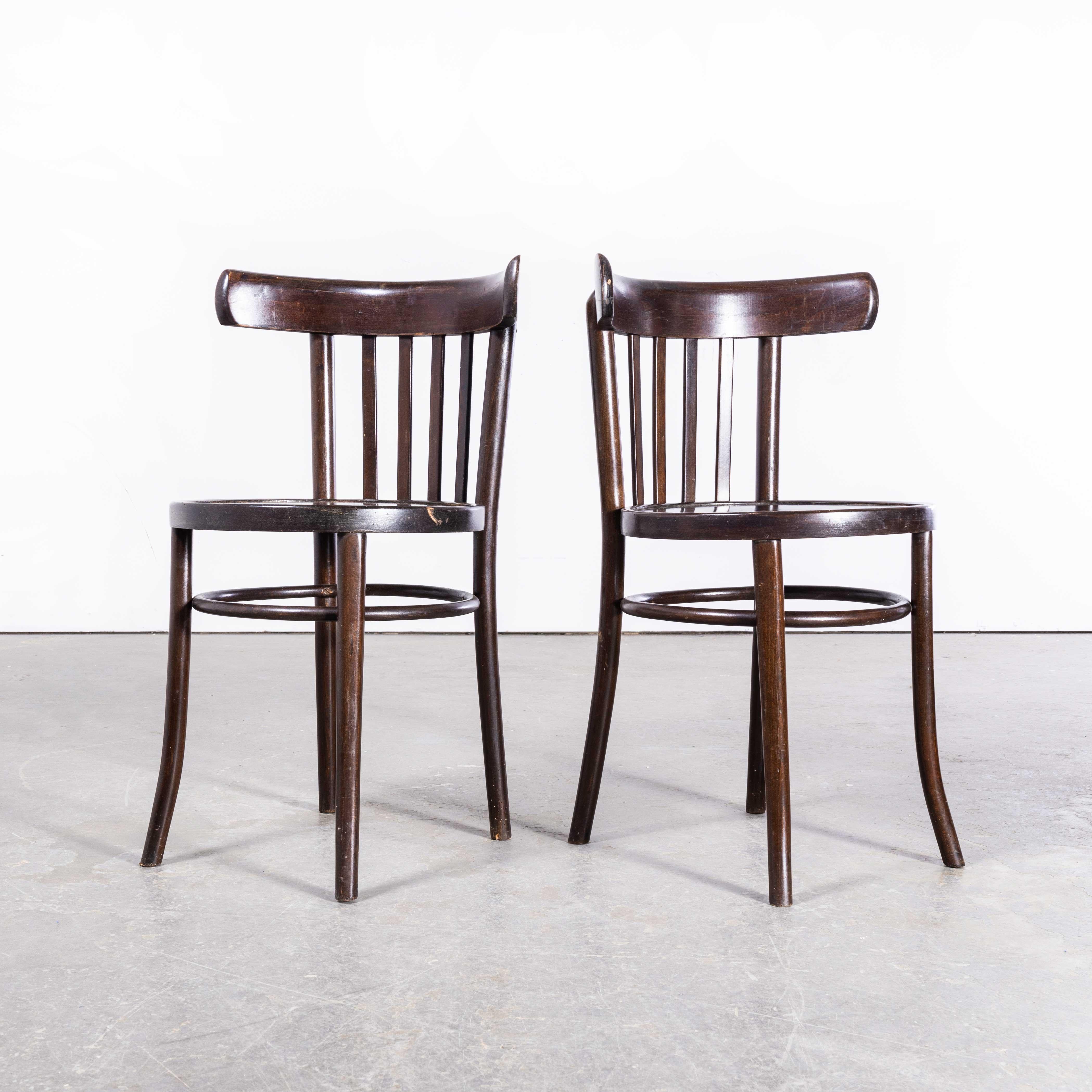 1960s Saddle Back Bistro Dark Walnut Dining Chair – Pair
1960s Saddle Back Bistro Dark Walnut Dining Chair – Pair. Good quality pair of Classic bentwood chairs with a rich dark stain back. The chairs were made in Eastern Europe using solid steam