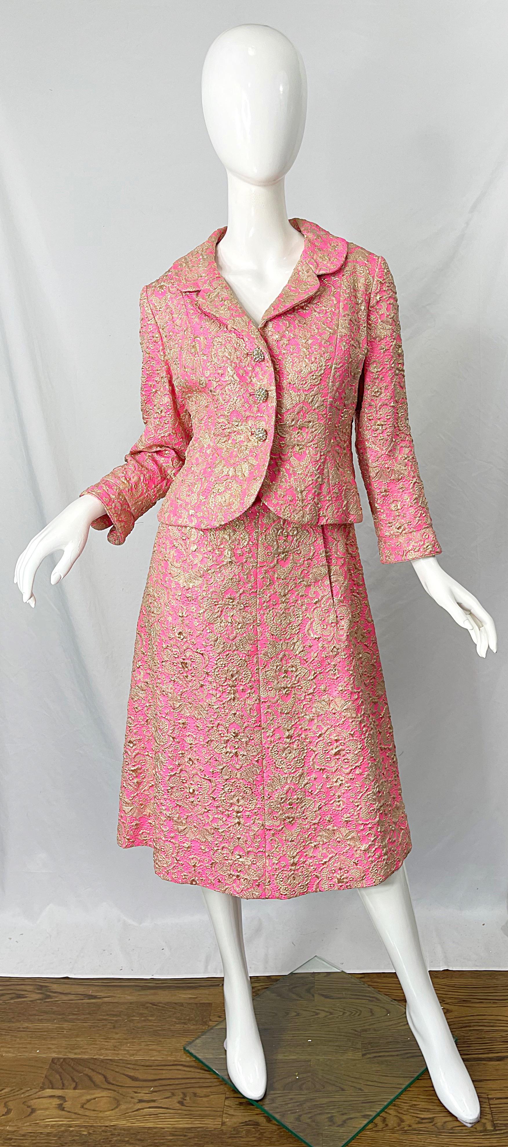 Chic 60s SAKS 5th AVE pink and gold silk brocade sleeveless Jackie O A-Line Dress with matching cropped jacket! Rhinestone encrusted buttons up the front center jacket. Dress features a tailored bodice with a full skirt. Hidden metal zipper up top