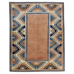 Tapis turc vintage saumon et bleu des années 1960 - 4'9 po. x 5'11 po.