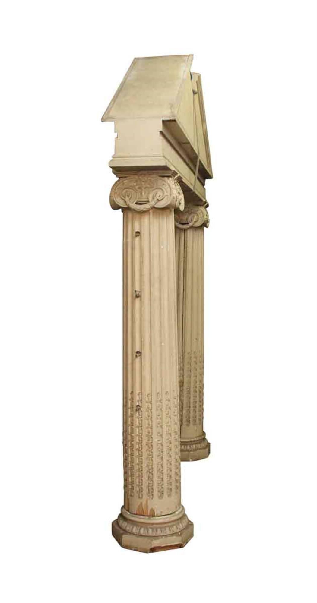 1960s pair of white entryway columns with large pediment. Priced as a set. This can be seen at our 400 Gilligan St location in Scranton, PA.