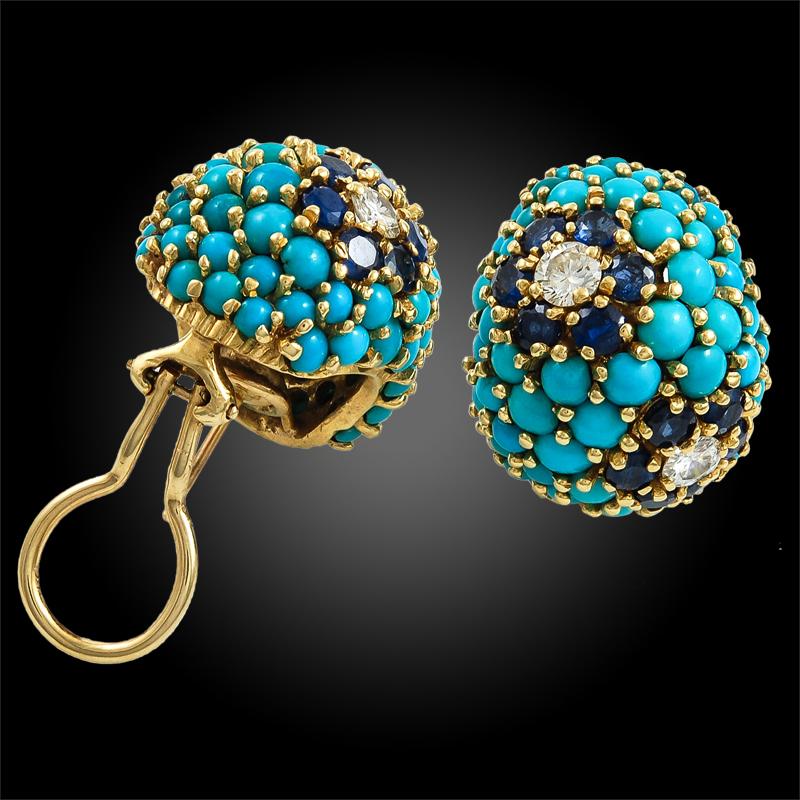 Retro-Style Turquoise Sapphire Diamond Bombe Suite in 18k Yellow Gold.

This bejeweled demi-parure consists of retro-style domed earrings, ring, and bracelet. All pieces in the suite are comprised of round cabochon turquoise configured in a