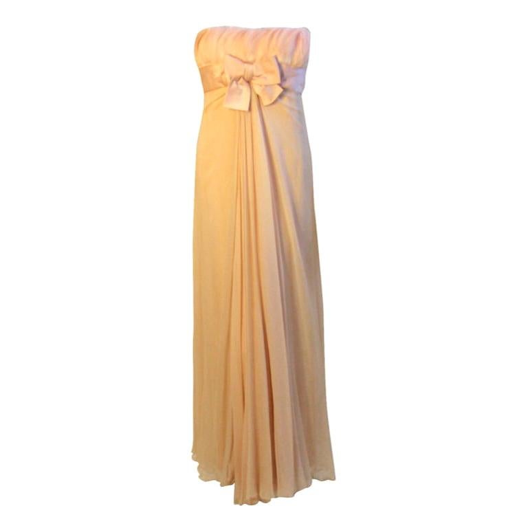 1960's Sarmi Pale Blush Pink Peach Chiffon Gown with Feather Bust & Bow Detail For Sale