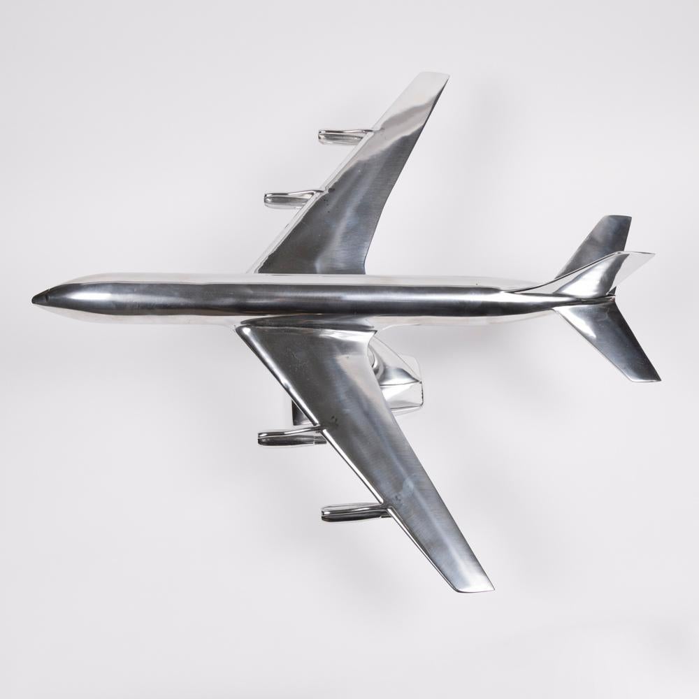 A aluminium scale model of a Boeing 720 circa 1965.

1/60 scale.

On original stand.


The Boeing 720 is a narrow-body airliner produced by Boeing Commercial Airplanes, a 707 derivative for shorter flights from shorter runways, the 720 first flew in