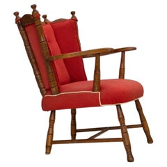 1960s, fauteuil scandinave. Laine d'ameublement rouge, bois de hêtre.