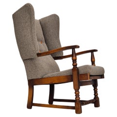 Vintage 1960s, Scandinavian design, reupholstered armchair, wool fabric, oak wood.