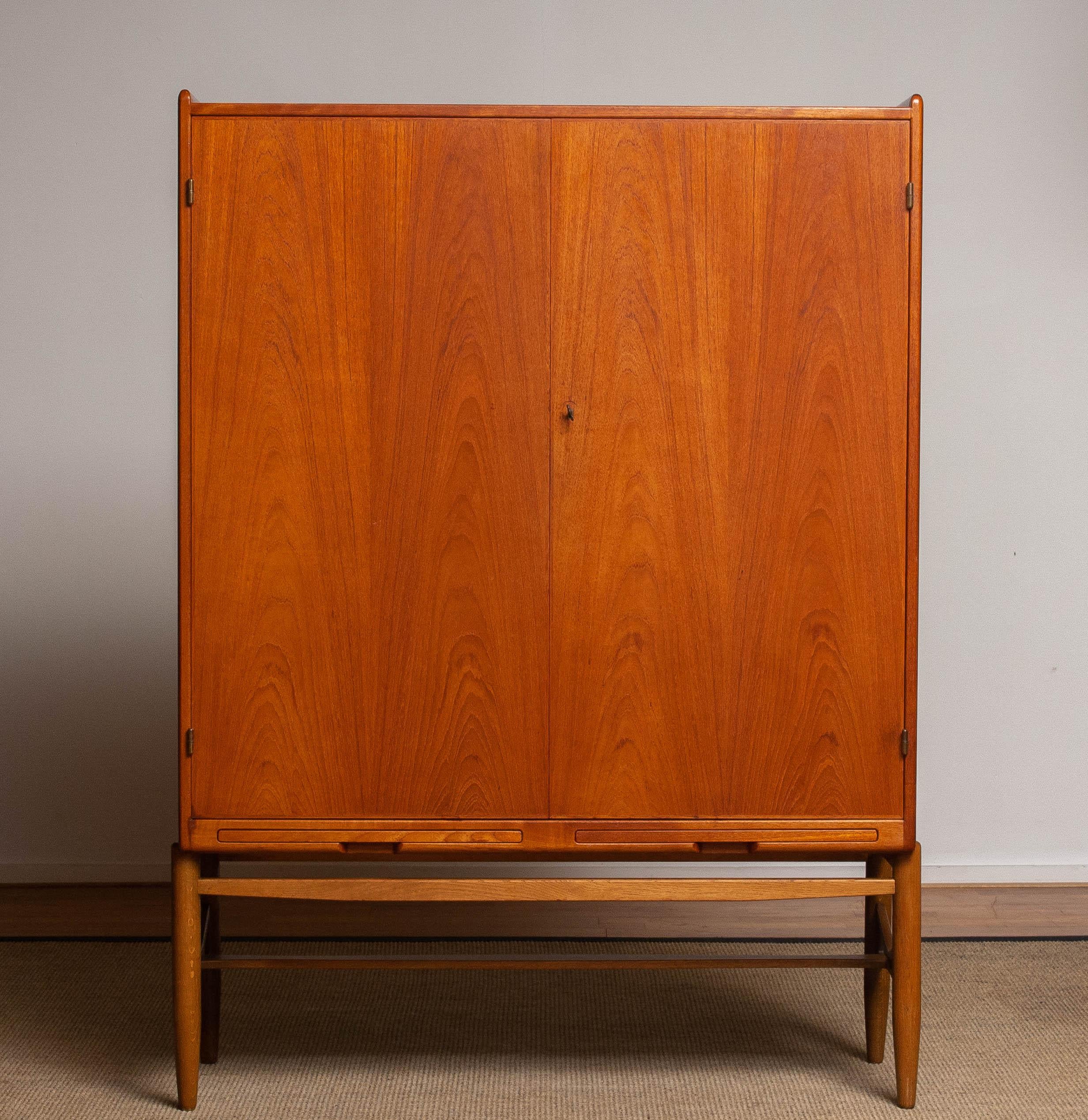 Mid-20th Century 1960's Scandinavian House Keepers / Storage Cabinet in Teak and Oak by Westbergs