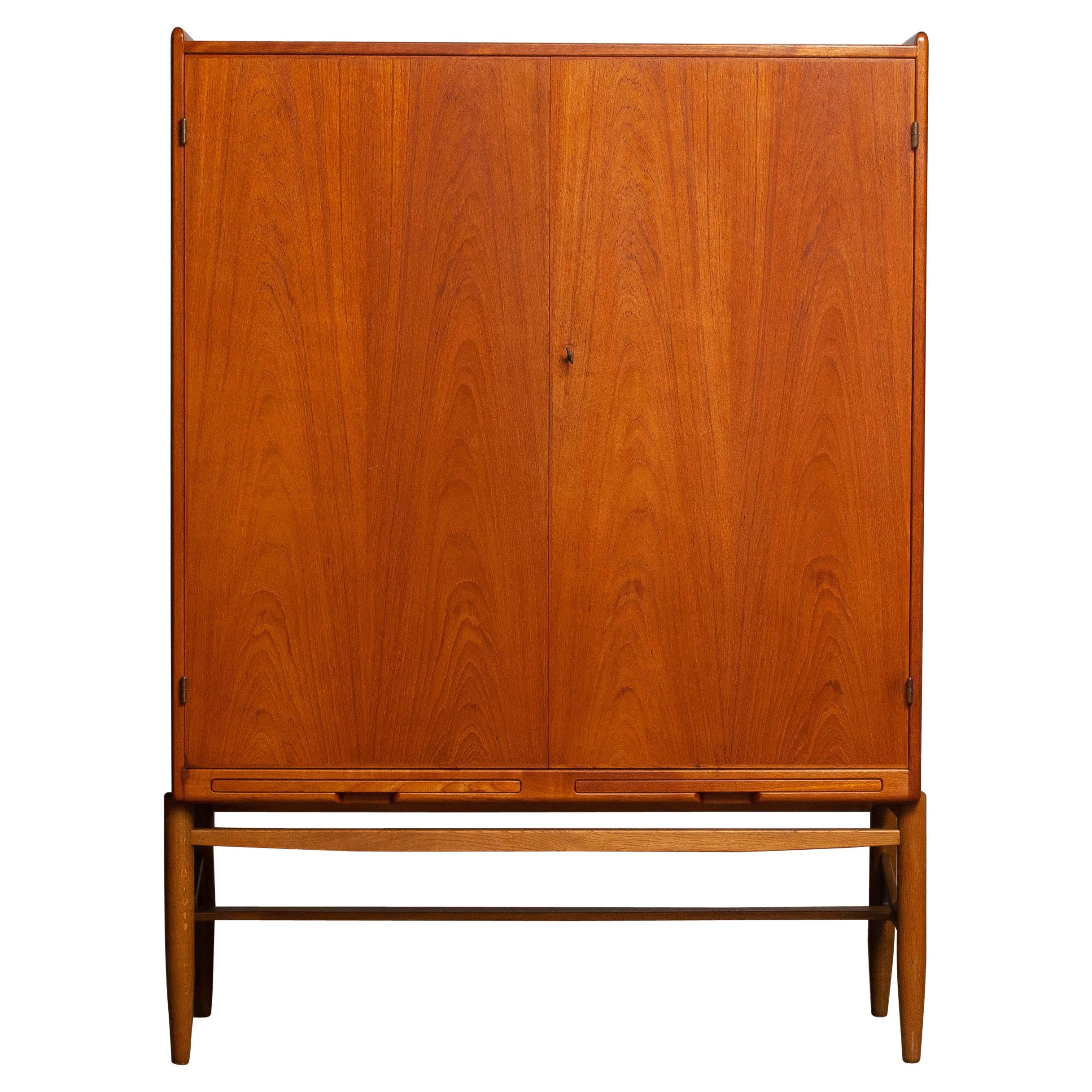 1960
s Scandinavian House Keepers / Storage Cabinet in Teak and Oak by Westbergs