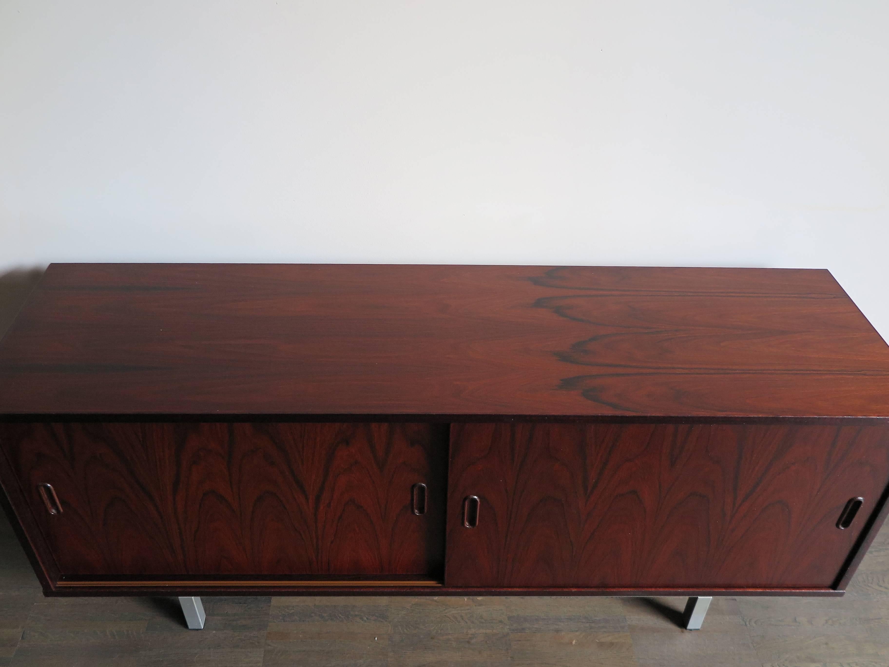 1960s Danish Mid-Century Modern rosewood sideboard with two sliding doors and metal legs.