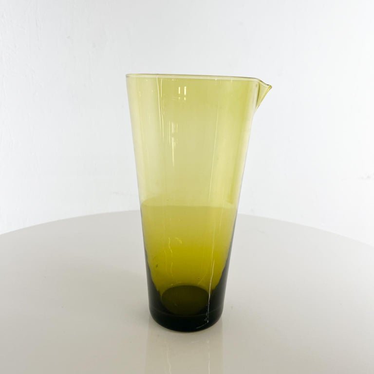 1960s Scandinavian Modern green glass Juice Carafe Iittala Finland
Measures: 8 tall x 4 diameter at widest
Unmarked
Preowned original vintage condition
See our images provided.
 