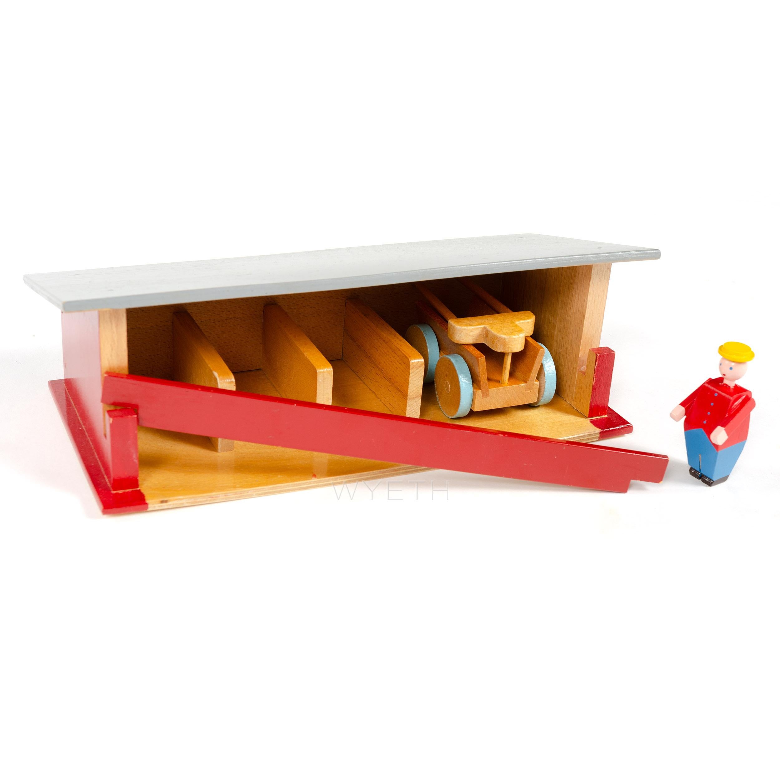 A brightly colored and whimsical miniature farm set by the Danish master of whimsey Kay Bojesen. The fifteen individual wooden pieces consist of a farmhouse of laminated beech with removable gray roof, two beds a bench, two tables, barn of laminated