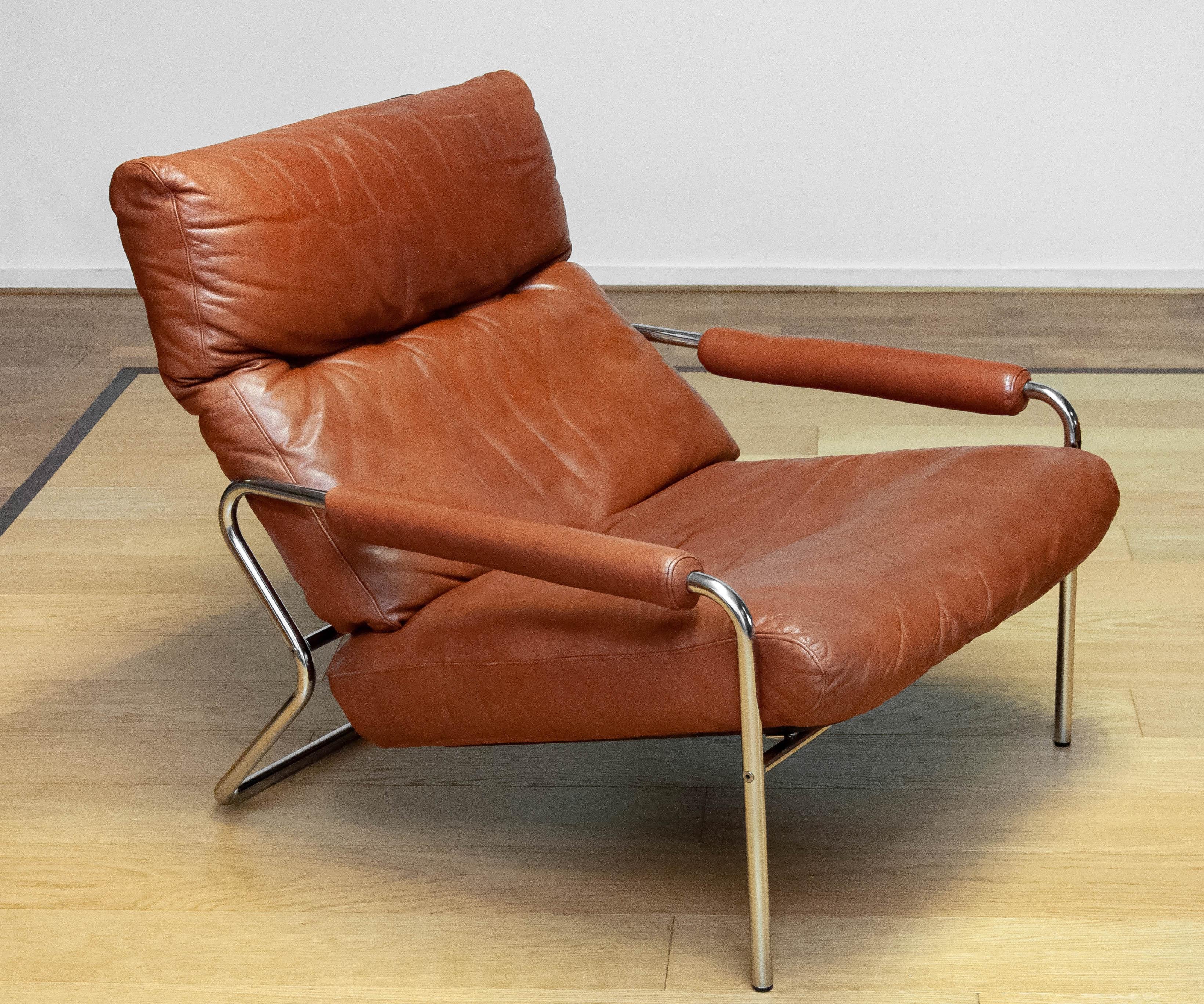 Metal 1960s Scandinavian Modern Tubular Chrome And Brown Leather Lounge Chair