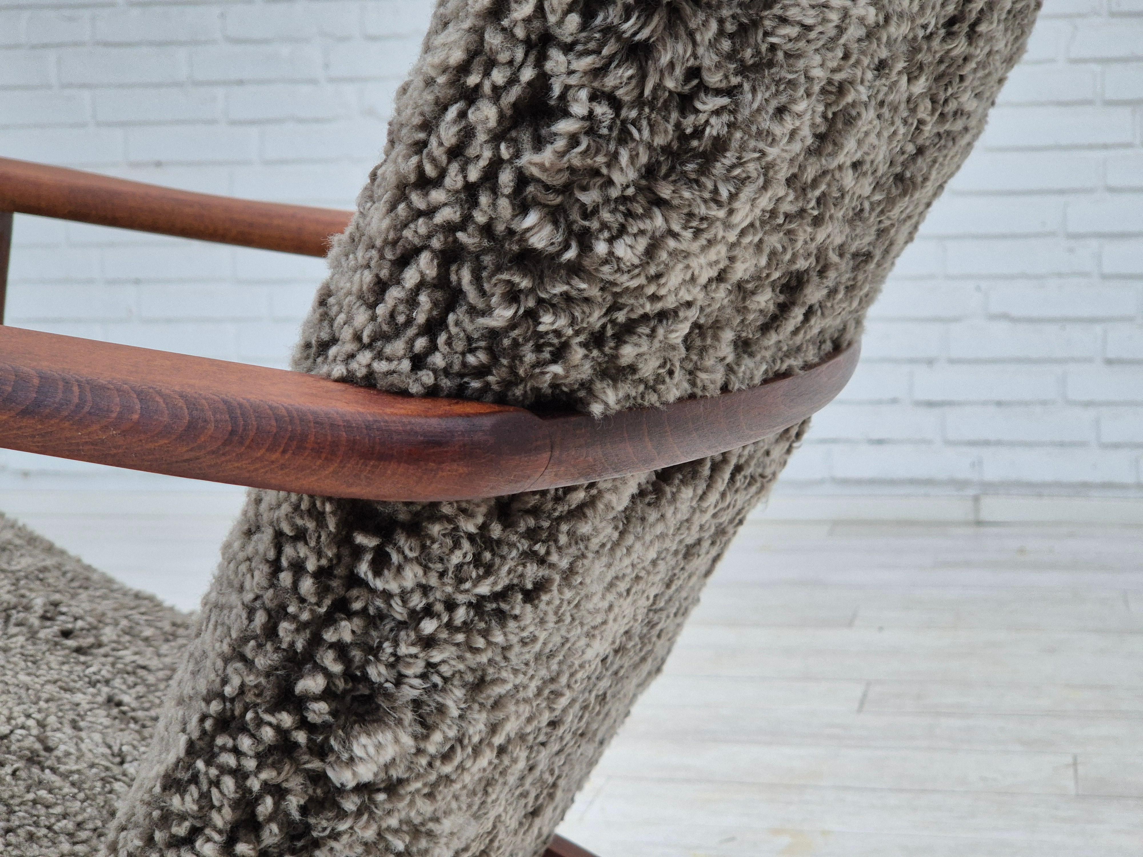 1960s, Scandinavian rocking chair, reupholstered in quality genuine sheepskin. 5