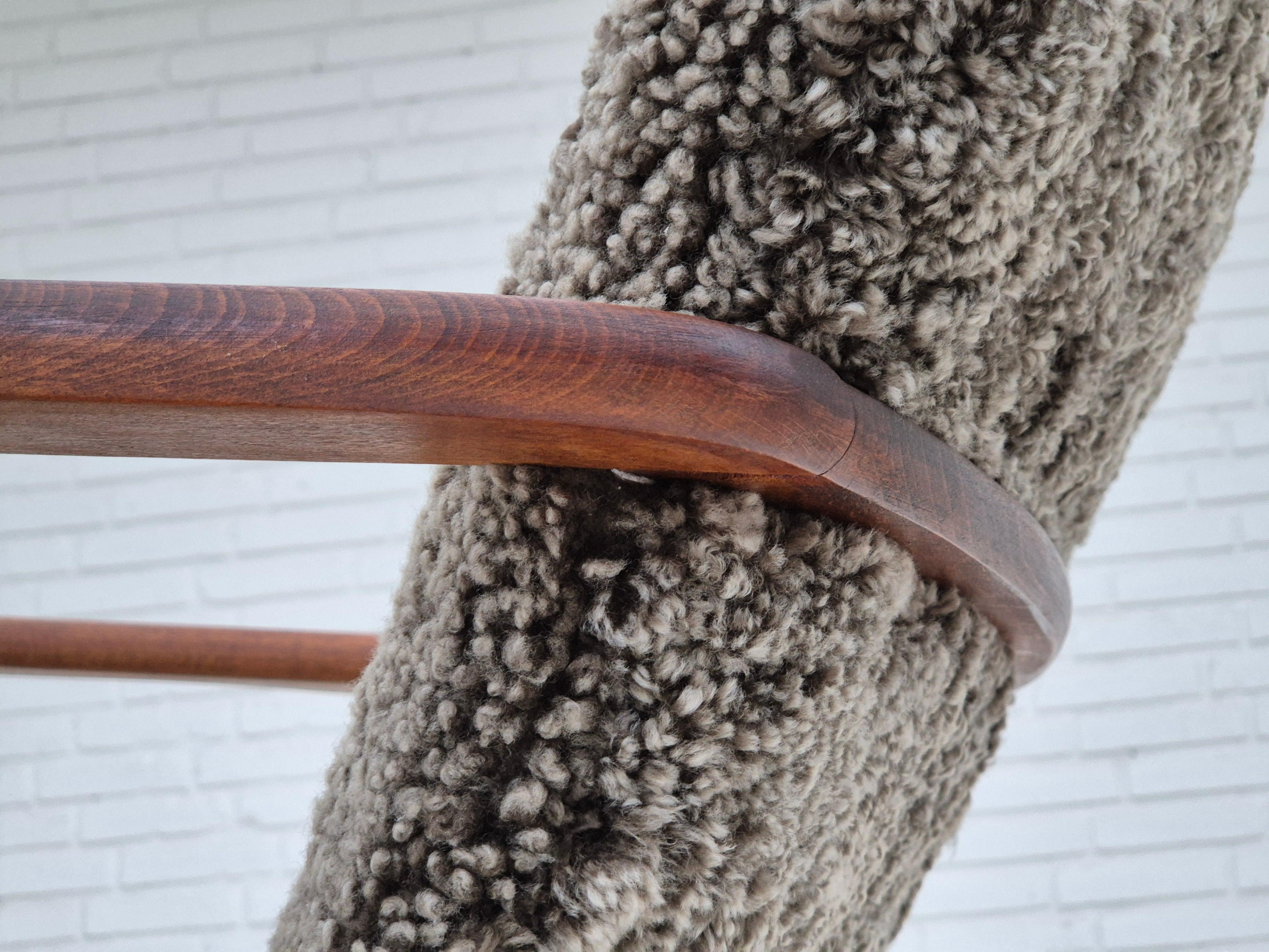 1960s, Scandinavian rocking chair, reupholstered in quality genuine sheepskin. 6